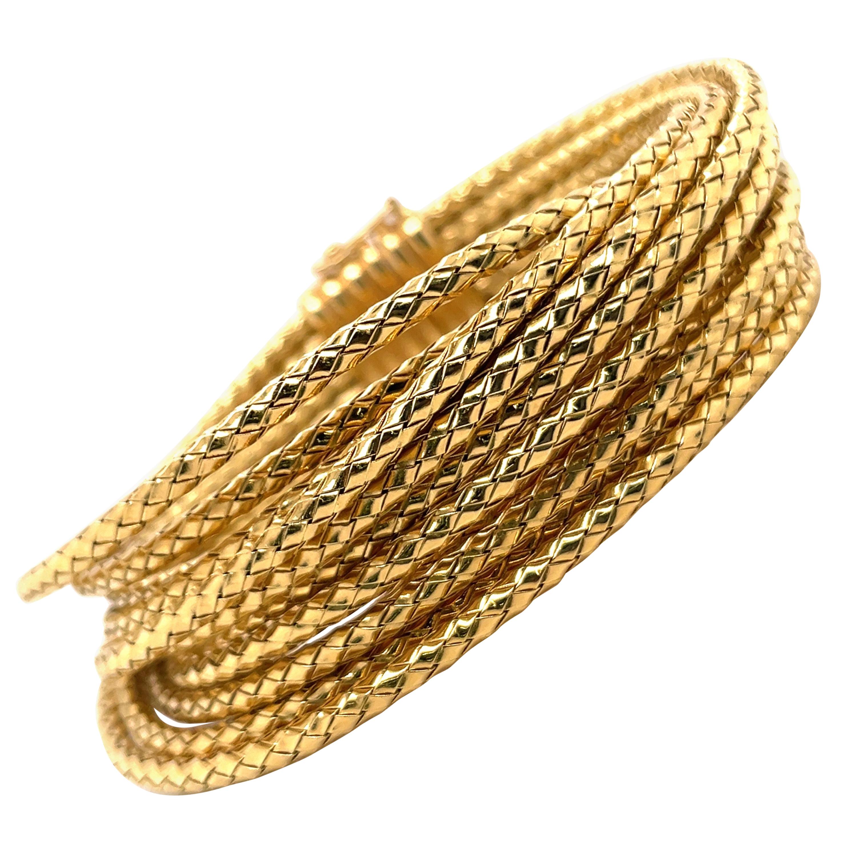 Bracelet jonc texturé multi fils en or jaune 18 carats, 77.2 grammes, fabriqué à Rome