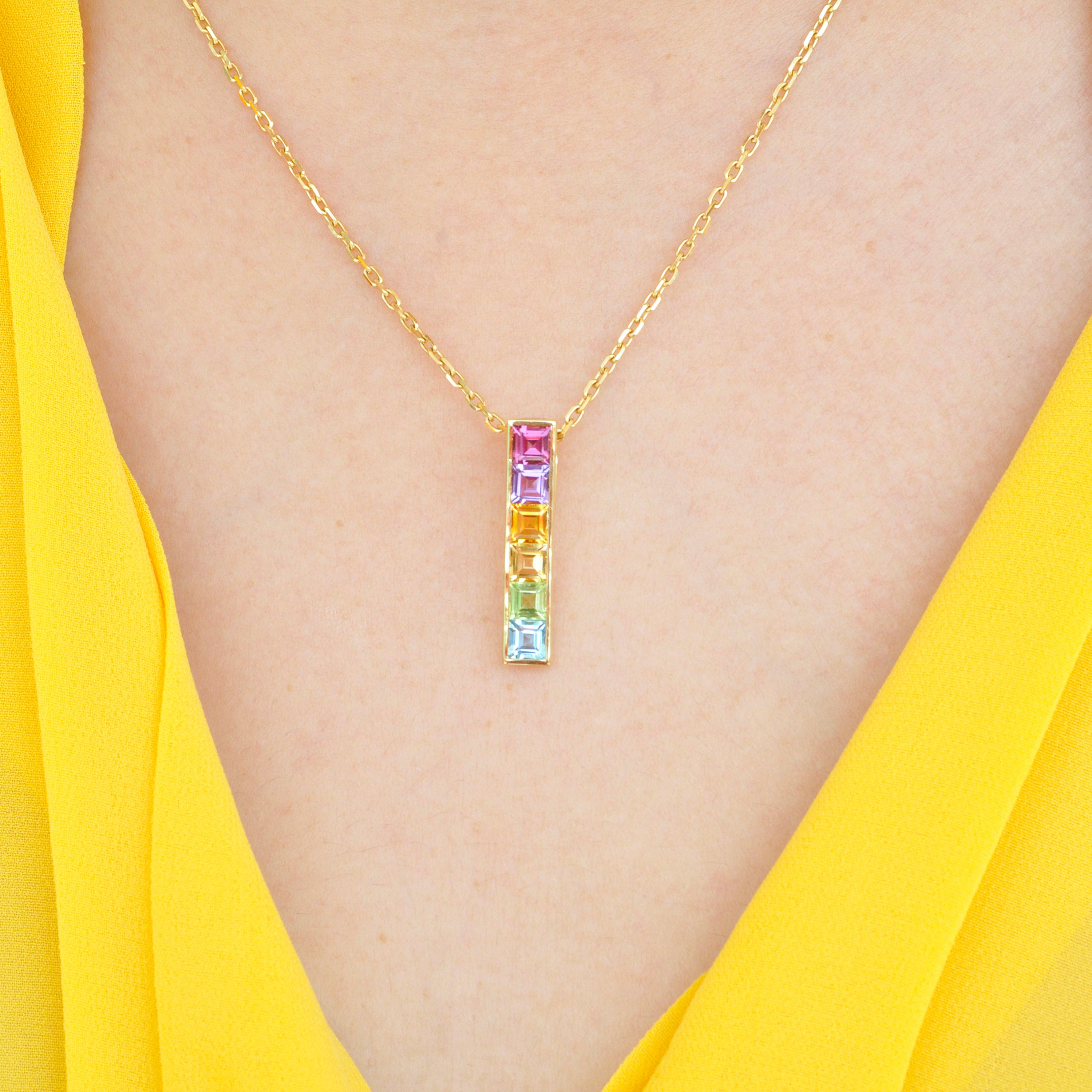 18 karat yellow gold multicolour linear rainbow bar pendant necklace

Add something special to your jewellery box with the Multicolour Rainbow Bar Pendant. Set in 18 Karat gold, this classic linear design features channel set natural gemstones like