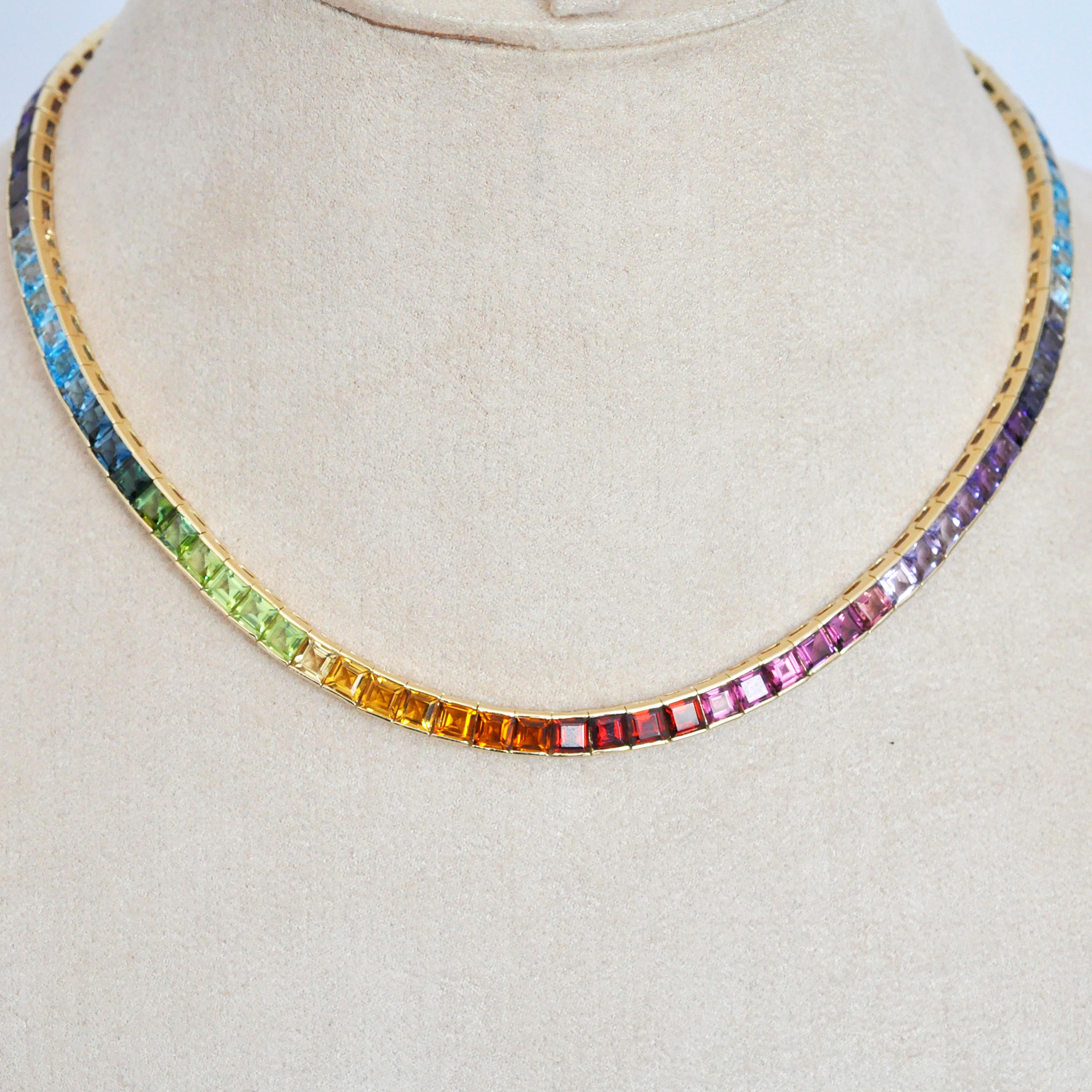 18 karat yellow gold multicolour rainbow natural gemstone tennis line necklace

This seamless multicolour rainbow tennis link necklace set in 18 karat gold is an absolute stunner. The rainbow necklace features lustrous natural gemstones like