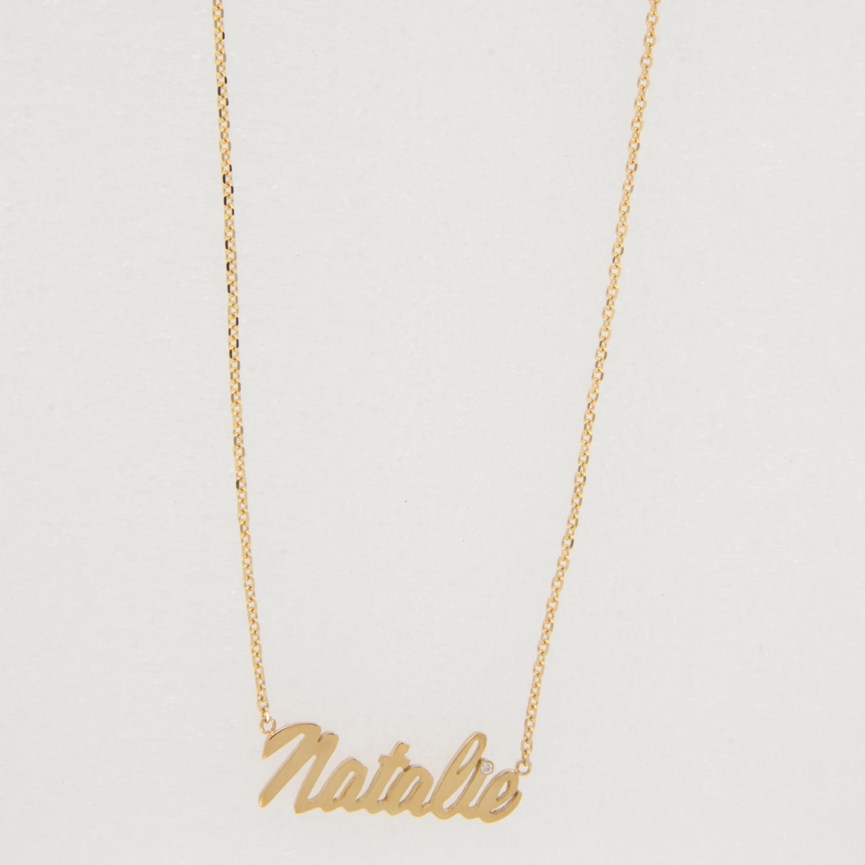 Calling all Natalie's! If your name isn't Natalie you'll wish it was! You will love wearing this beautiful 18 karat yellow gold Natalie necklace with 0.01Ct RBC diamond in 