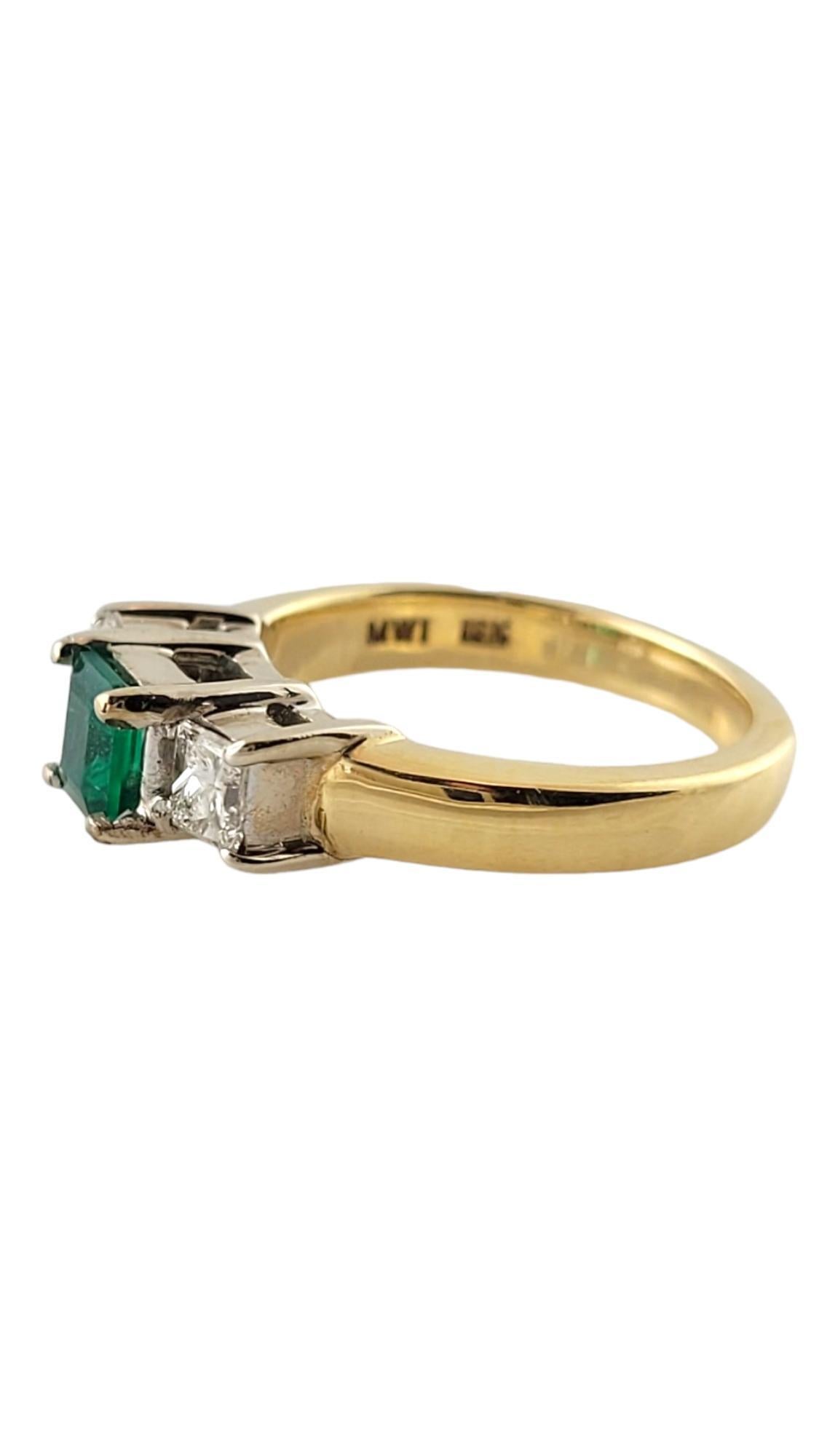 18 Karat Yellow Gold Natural Emerald and Diamond Ring Size 5.5

This lovely ring features one genuine emerald (approx. 5 mm x 4 mm) and two princess cut diamonds set in classic 18K yellow gold.  

Shank measures 2.5 mm.

Approximate total diamond