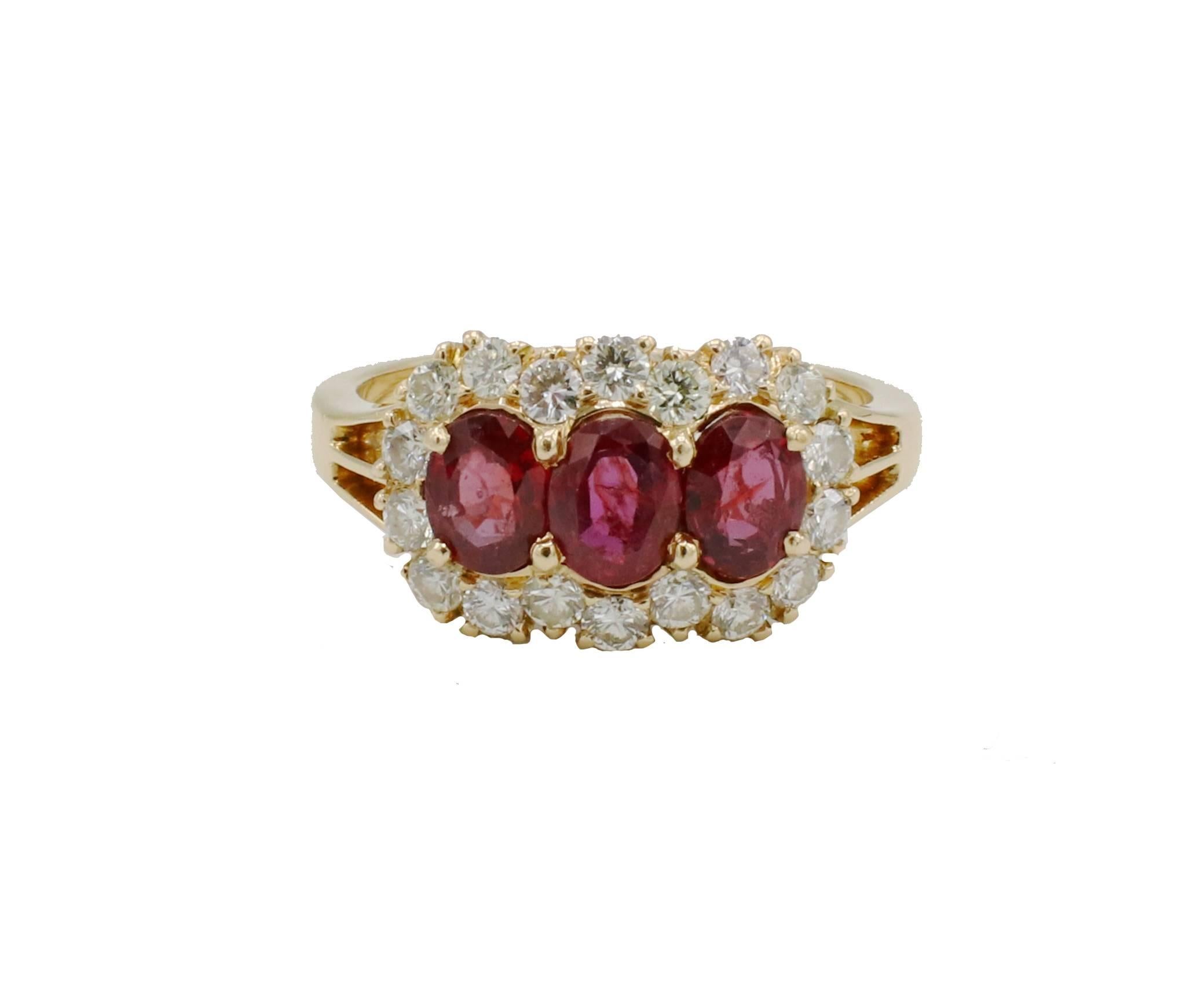 18 Karat Yellow Gold Natural Ruby & Diamond Halo Three-Stone Cocktail Ring 
Metal: 18k yellow gold
Weight: 4.65 grams
Diamonds: 18 round brilliant natural diamonds, approx. 0.55 CTW H-I VS
Ruby: 3 oval natural rubies, approx. 1 CTW 
Size: 6