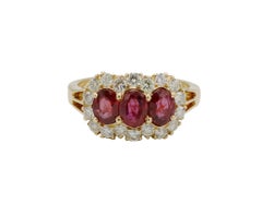 18 Karat Yellow Gold Natural Ruby & Diamond Halo Three-Stone Cocktail Ring