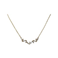 18 Karat Yellow Gold Necklace with 11 Straight Baguette Diamonds