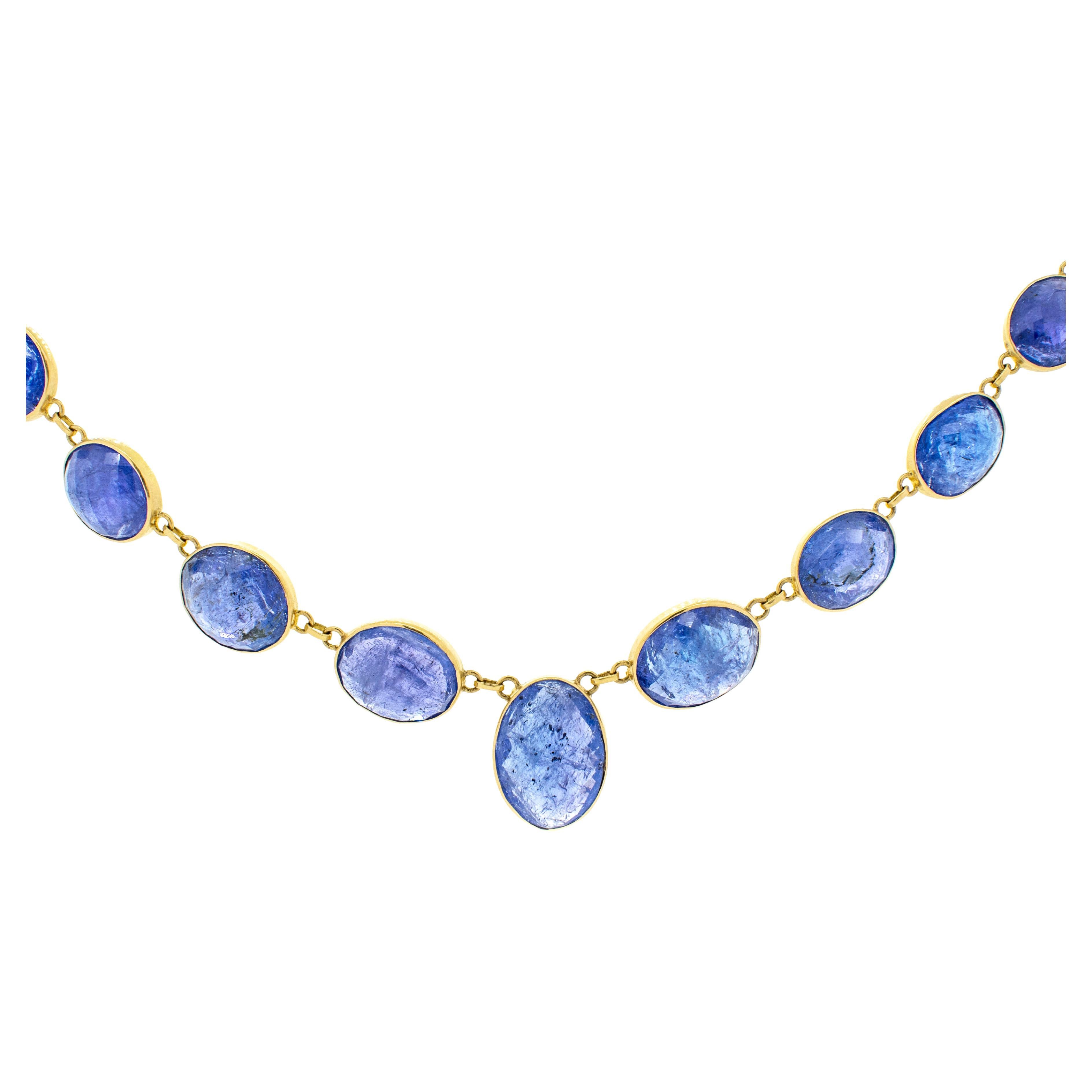 Collier en or jaune 18 carats avec 97,50 carats de tanzanite taille briolette en vente