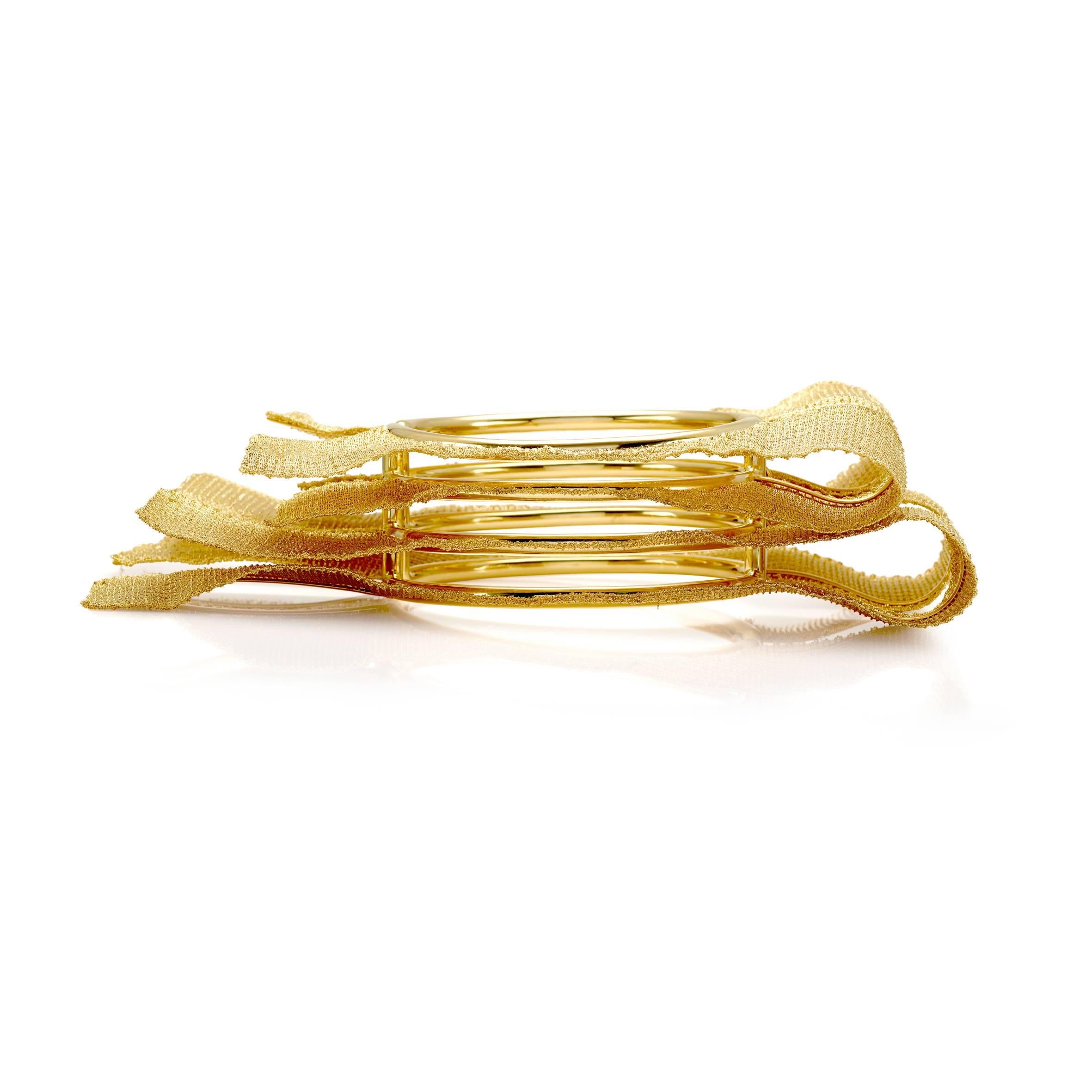 II Finaliste au concours des bijoux de l'Oscar
Ce bracelet a été spécialement conçu pour le concours.
bracelet en or jaune 18K 
Poids total de l'or gr 197,90
Tampon MICHELETTO 10MI 750

Ce bracelet peut être associé à la bague 4768-H et au collier