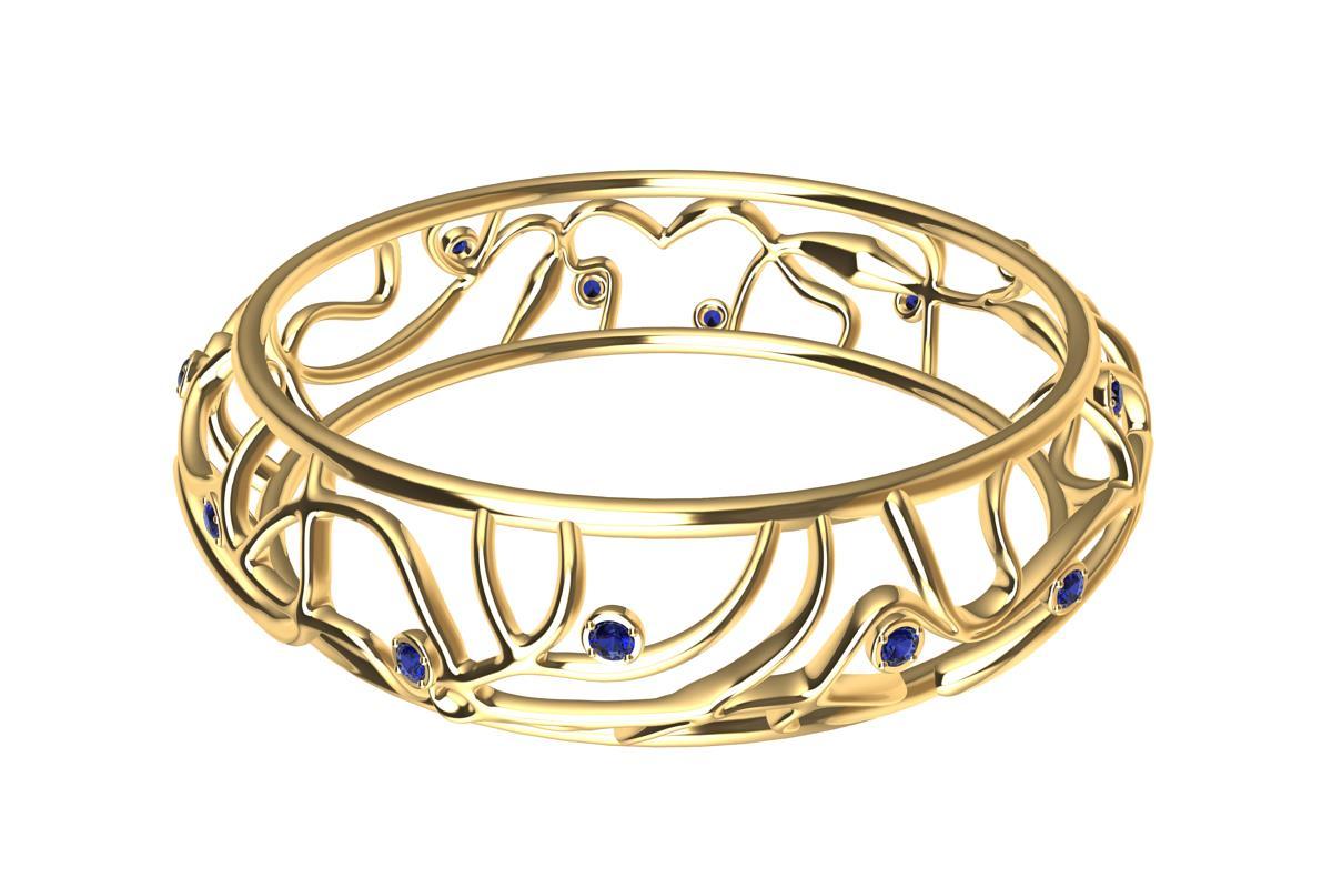 18 Karat Yellow Gold Sapphires Oceans Bangle,  1.68 ct. wt. AGTA  14 - 3mm diamond cut sapphires.  More blue all year long! My favorite place on earth. The ocean. Now with sparkling sapphires. As unpredictable as the ocean. Different every time with