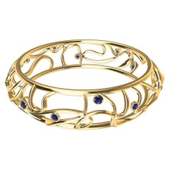 Armband aus 18 Karat Gelbgold mit Ozean-Saphiren