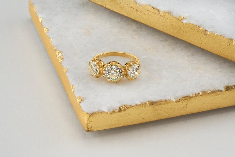 Women's 18 Karat Yellow Gold Old European Cut Diamond Three-Stone Ring