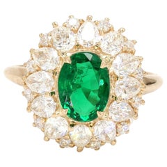 18 Karat Yellow Gold Old Mined Sandwana 1.15 Carat Emerald Halo Diamond Ring