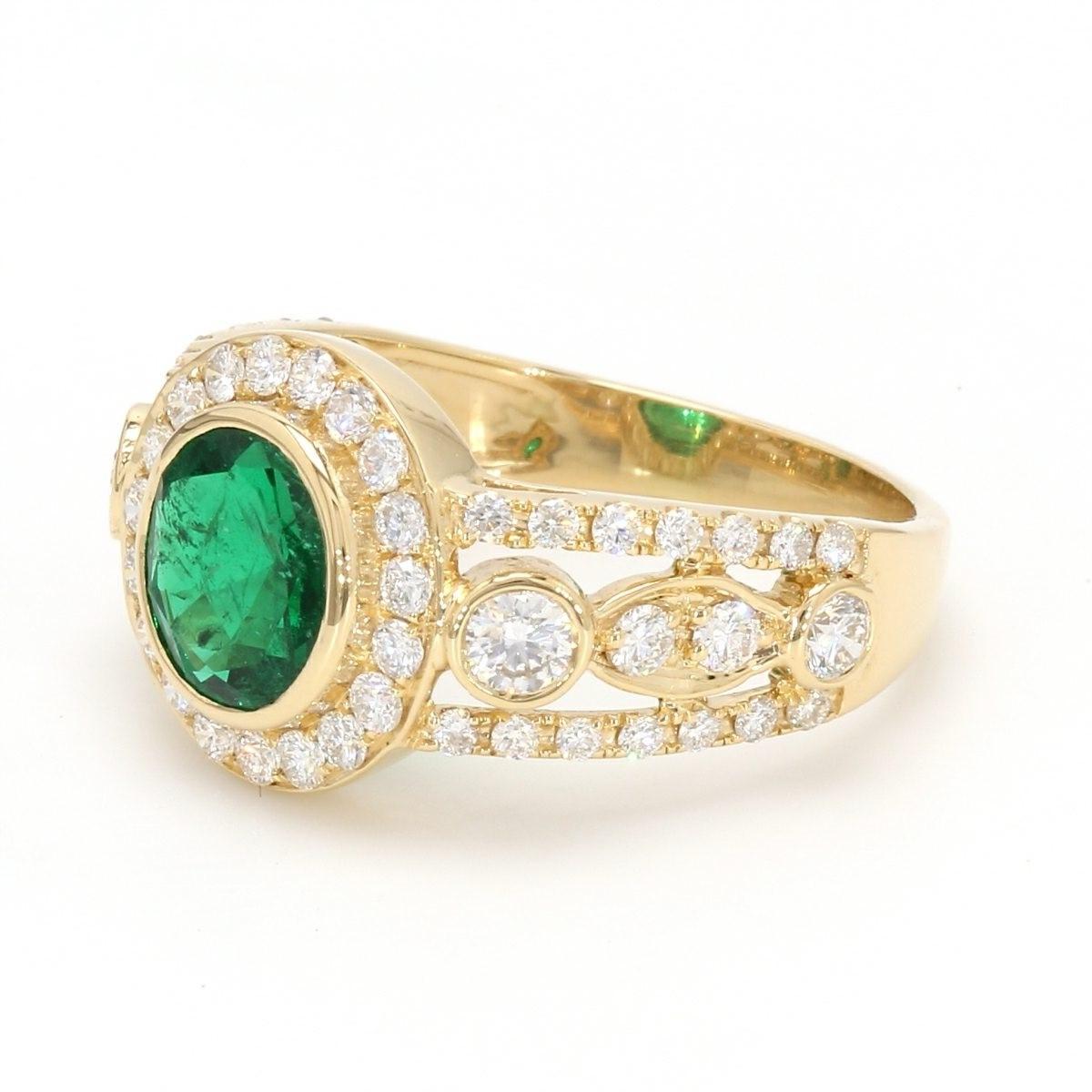 A Beautiful Handcrafted Ring in 18 Karat  Gold with Natural Old Mined Sandawan , Zimbabwe origin Emerald. Emerald from these Mines were known for its color and small Size and any size over 1.25 carat was a rarity.  Source GIA 

Emerald