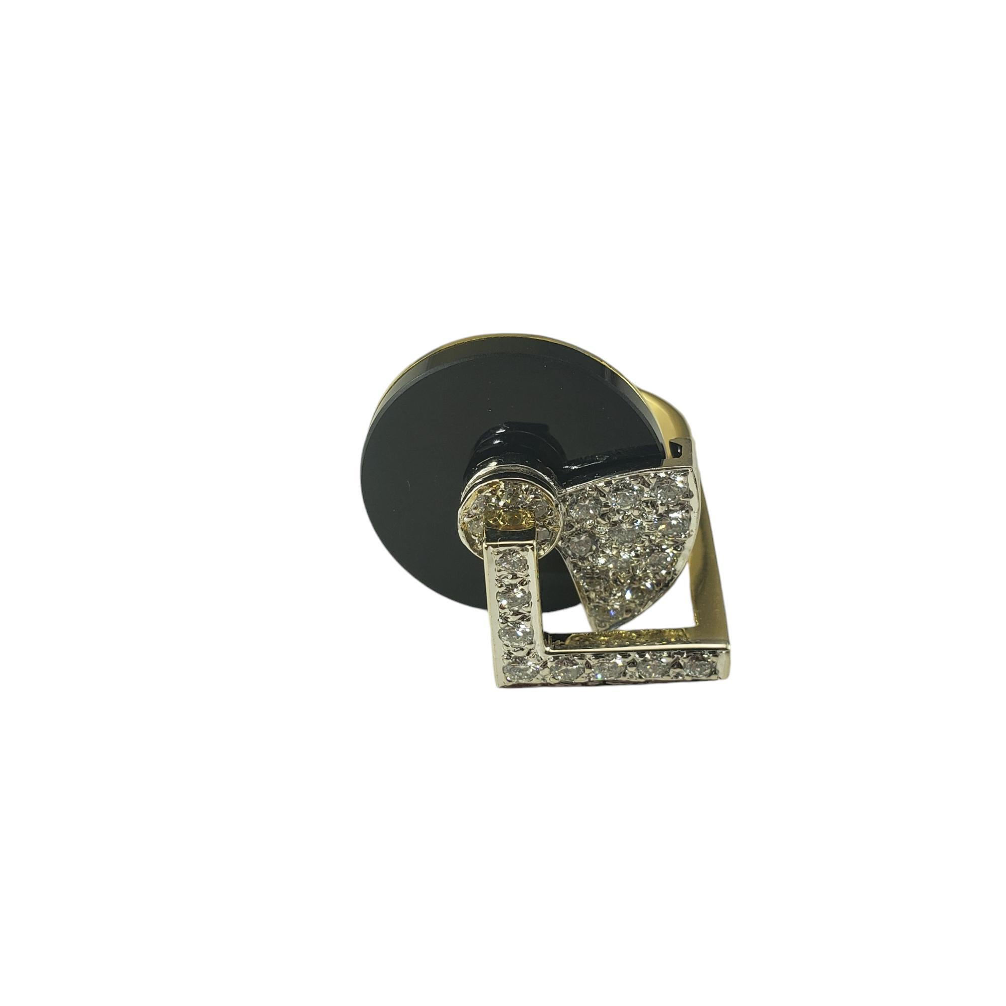 18 Karat Yellow Gold Onyx and Diamond Spinner Ring Size 7

This lovely ring with spinning center features black onyx and 25 round brilliant and single cut diamonds set in 18K yellow gold.  

Width: 21 mm.  Shank: 2 mm.

Approximate total diamond