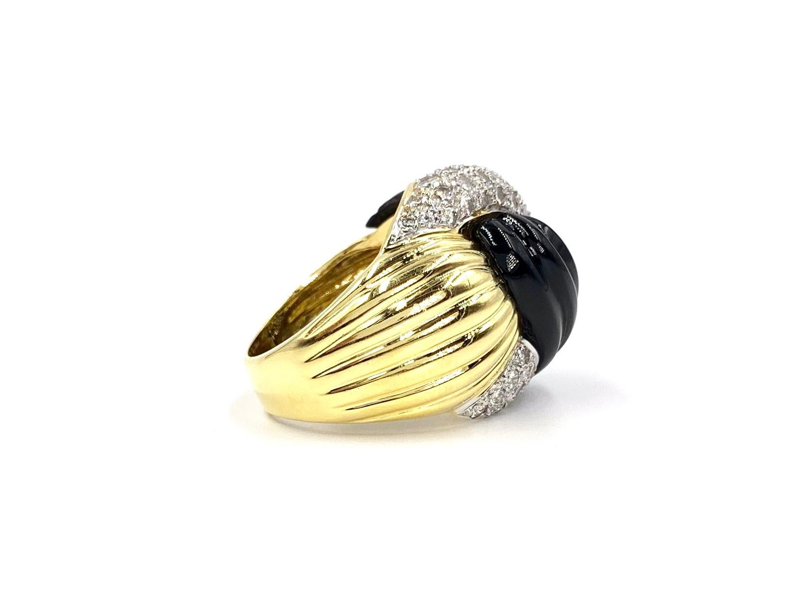 Modern 18 Karat Yellow Gold Onyx and Diamond Twist Ring