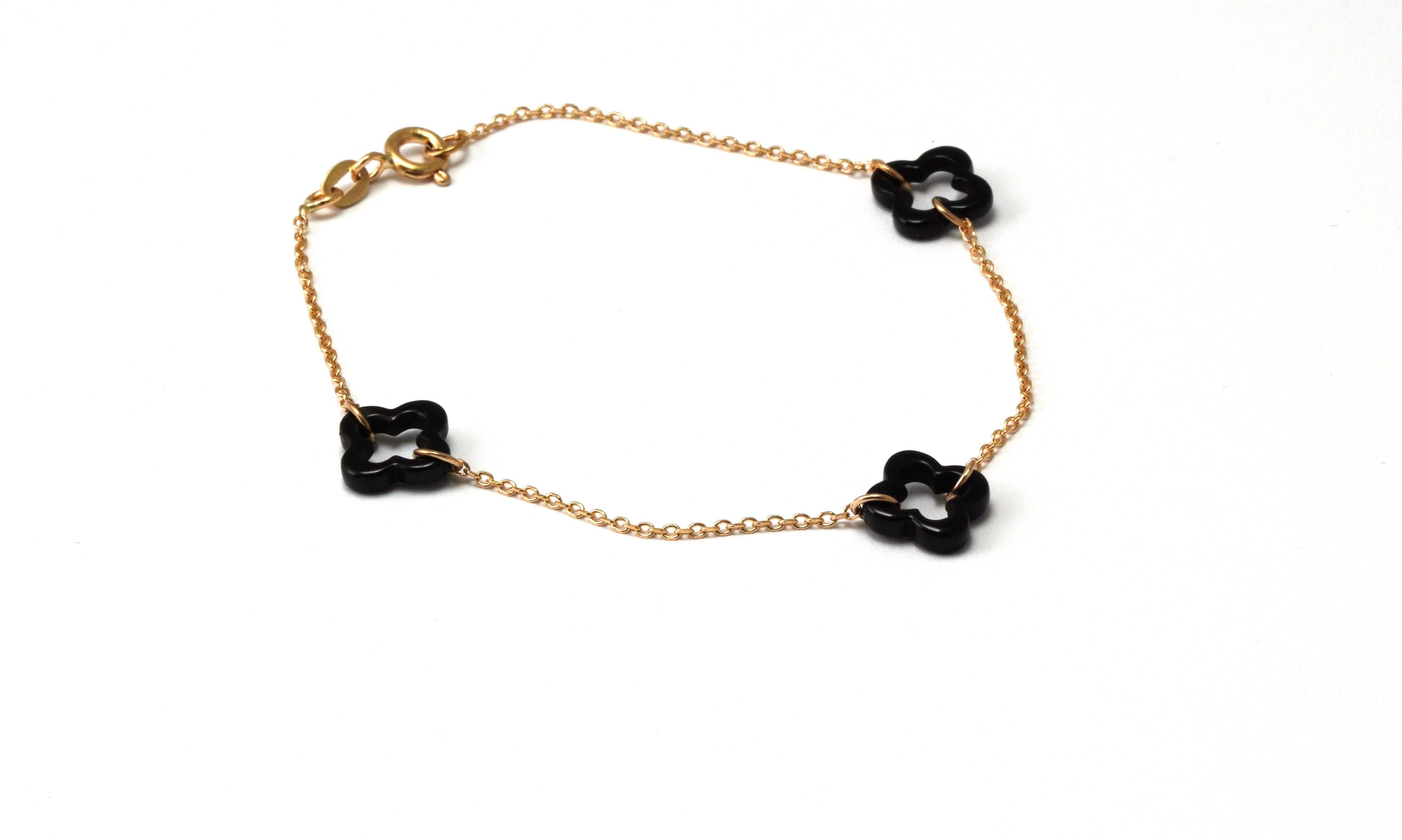 Moderne Bracelet en or jaune 18 carats et onyx en vente