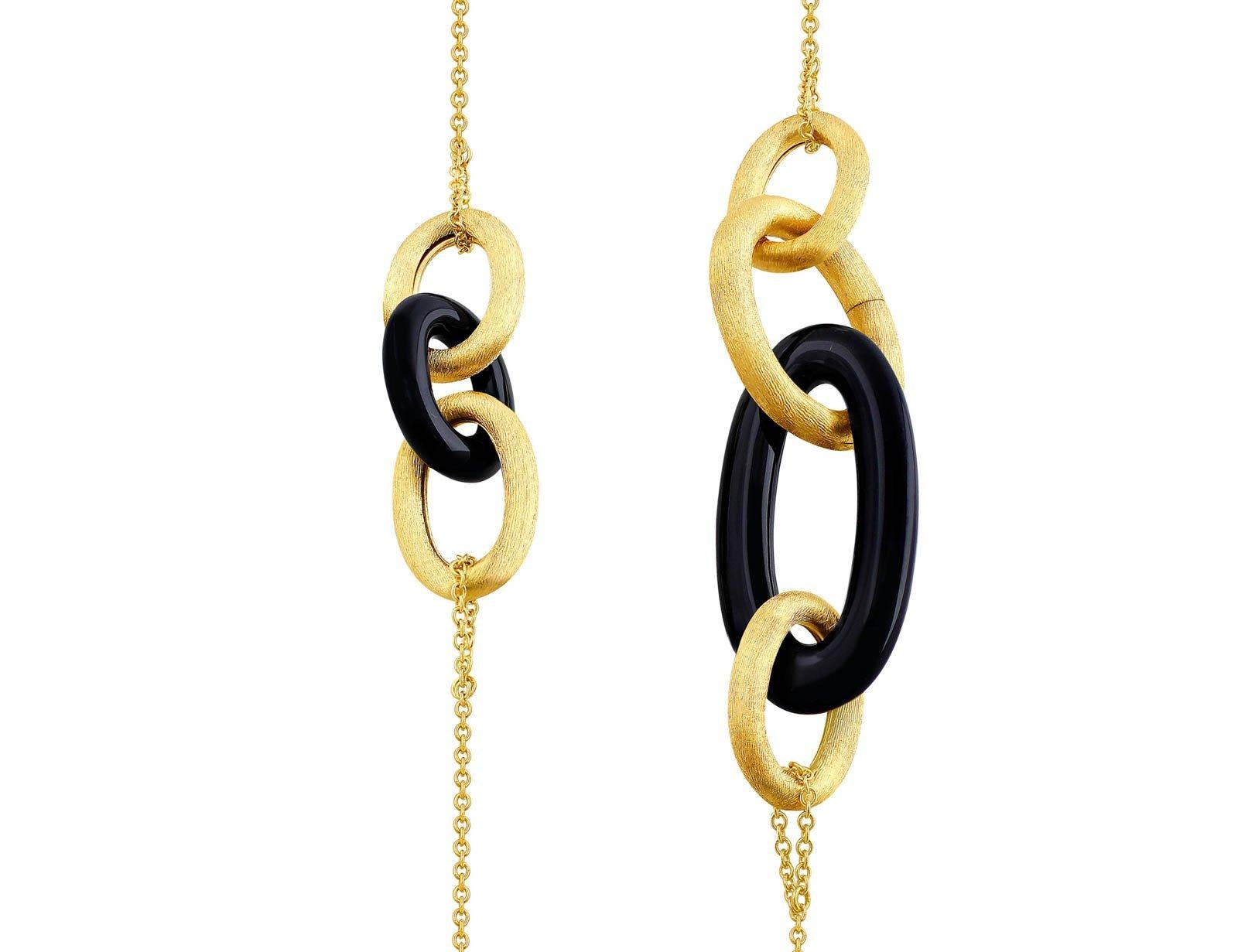 18kt yellow gold & onyx contemporary necklace. This long necklace has large yellow gold chain links with brush finish intermixed with large onyx links.