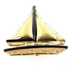 18 Karat Yellow Gold Onyx Diamond Sailboat Pendant Pin