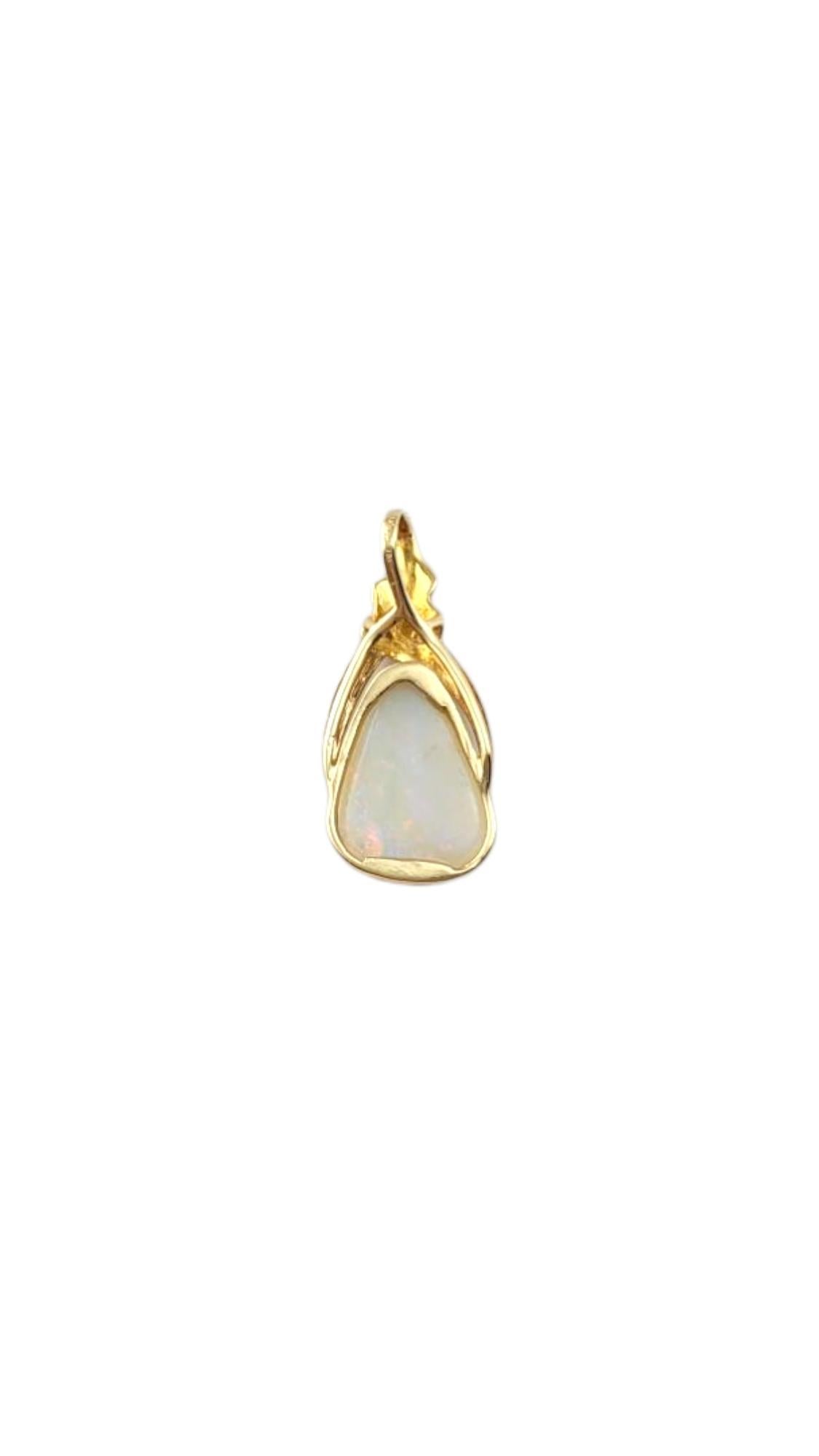 18 Karat Yellow Gold Opal Pendant-

This 18 Karat Yellow Gold Opal Pendant is a mesmerizing piece that captures the vibrant colors and unique beauty of opal. With its radiant gold setting and stunning gemstone, it’s a perfect addition to any jewelry
