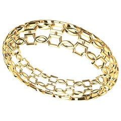 18 Karat Yellow Gold Open Circles Bangle