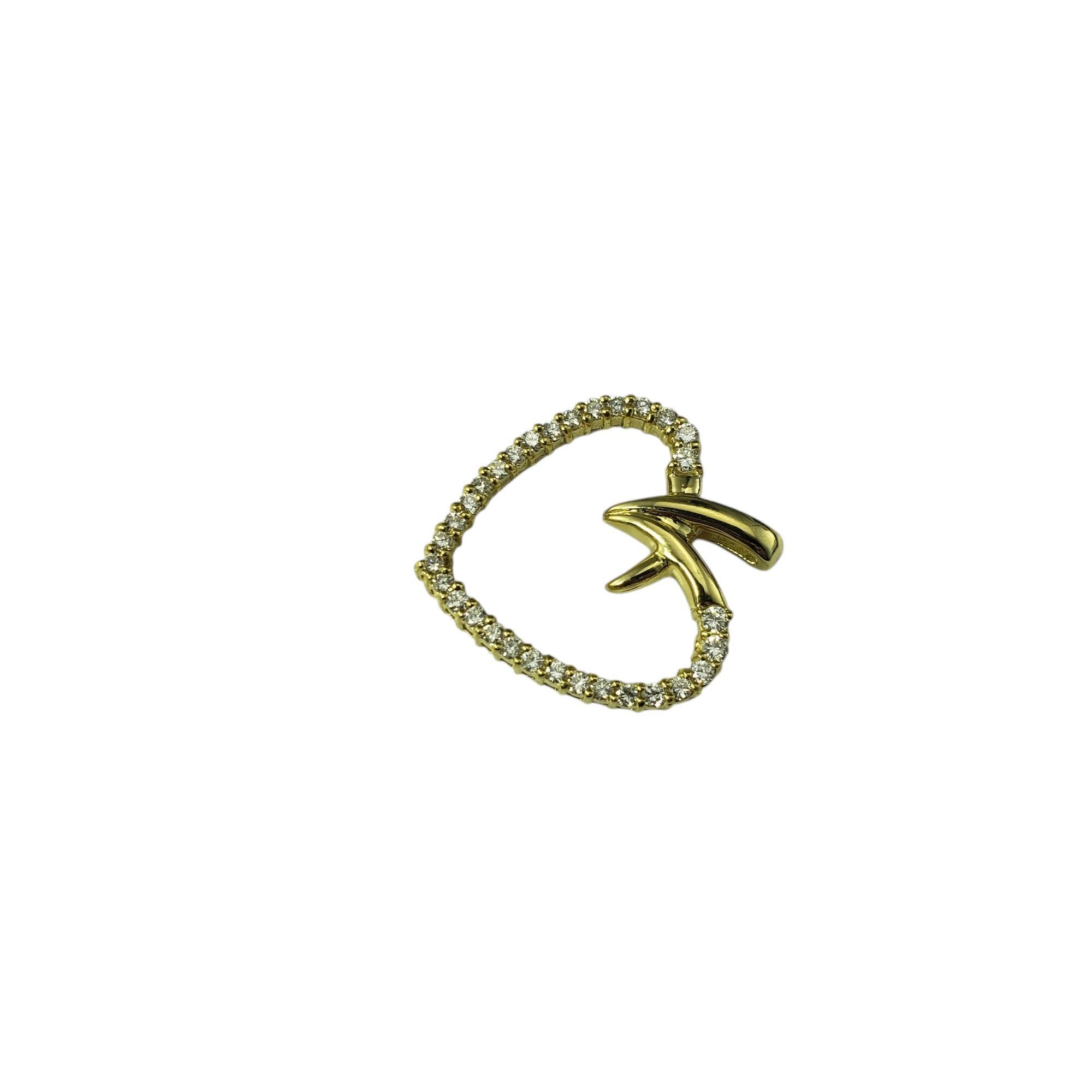 Pendentif en or jaune 18 carats avec cœur ouvert en diamant

Ce pendentif étincelant en forme de cœur ouvert est orné de 31 diamants ronds de taille brillante sertis dans de l'or jaune 14K classique.

Poids total approximatif des diamants : 0,40 -