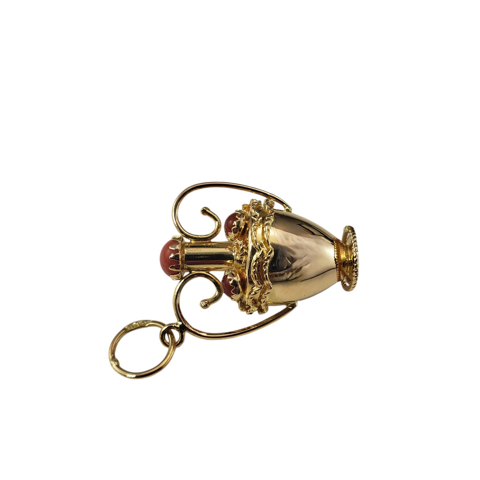 18 Karat Yellow Gold Ornate Urn Charm-

This lovely charm features a beautifully detailed urn accented with five orange gemstones set in 18K yellow gold.

Stamped: 750

Size: 29 mm x 24 mm

Weight: 4.6 dwt. / 7.2 gr.

*Chain not included.

Very good