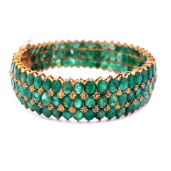 18 Karat Yellow Gold Oval 75 Carat Jade Bangle Bracelet 7 Inch 35.40 Grams