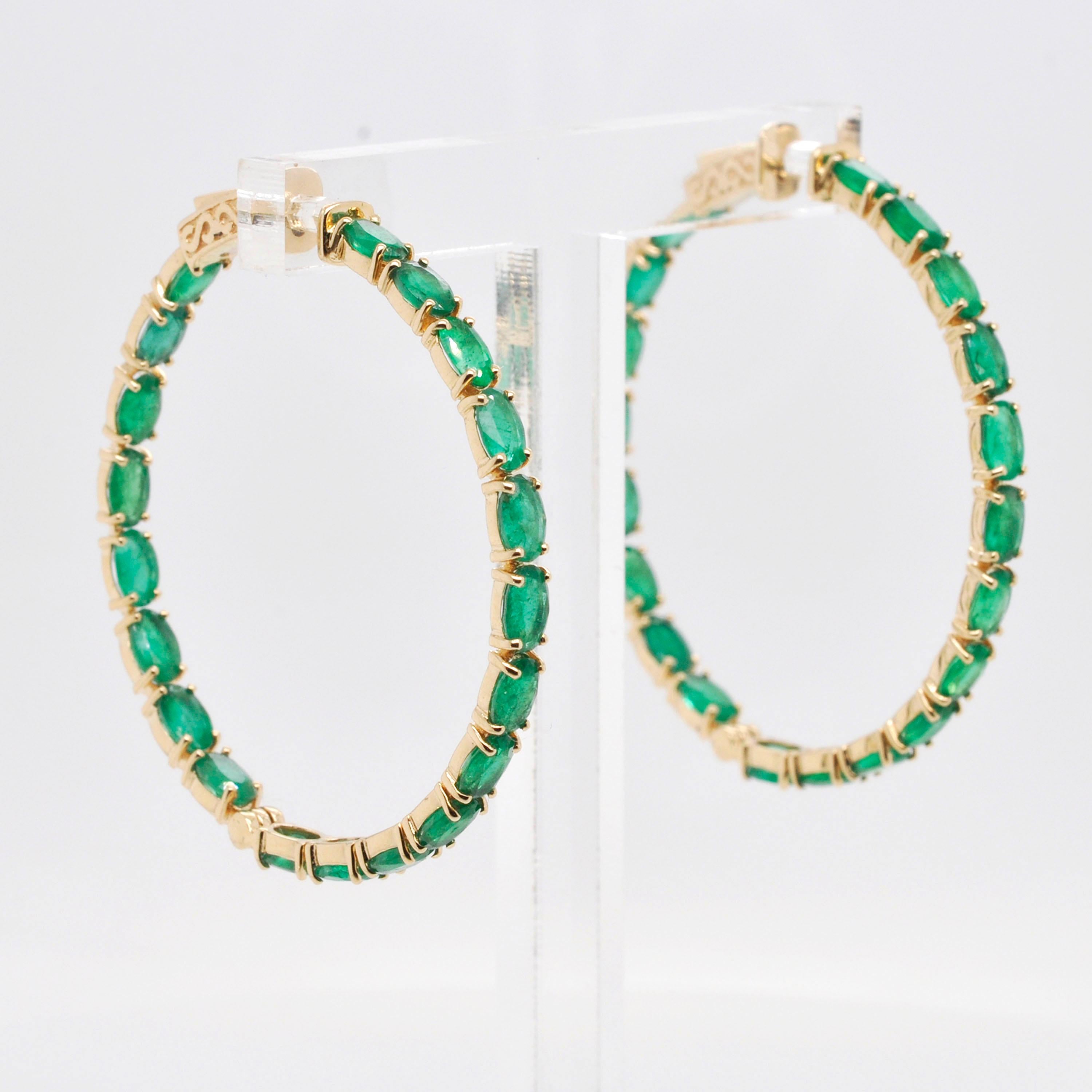 Modern 18 Karat Yellow Gold Oval Brazilian Emeralds Hoop Earrings For Sale