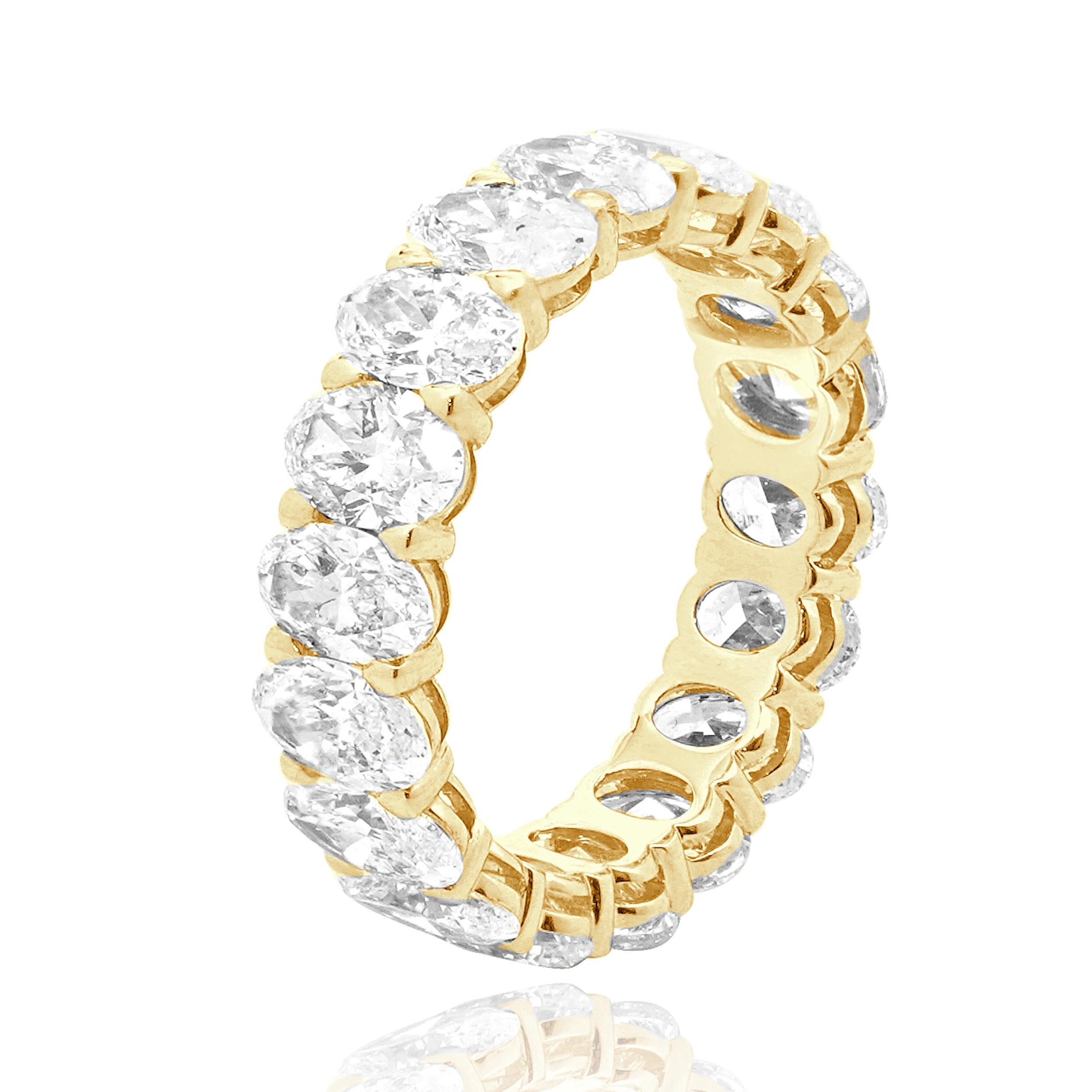 Designer: custom
Material: 18K yellow gold
Diamond: 18 oval cut = 5.55cttw
Color: H / I
Clarity: VS-SI2
Ring size: 6.5 (please allow two additional shipping days for sizing requests)
Weight: 3.75 grams
