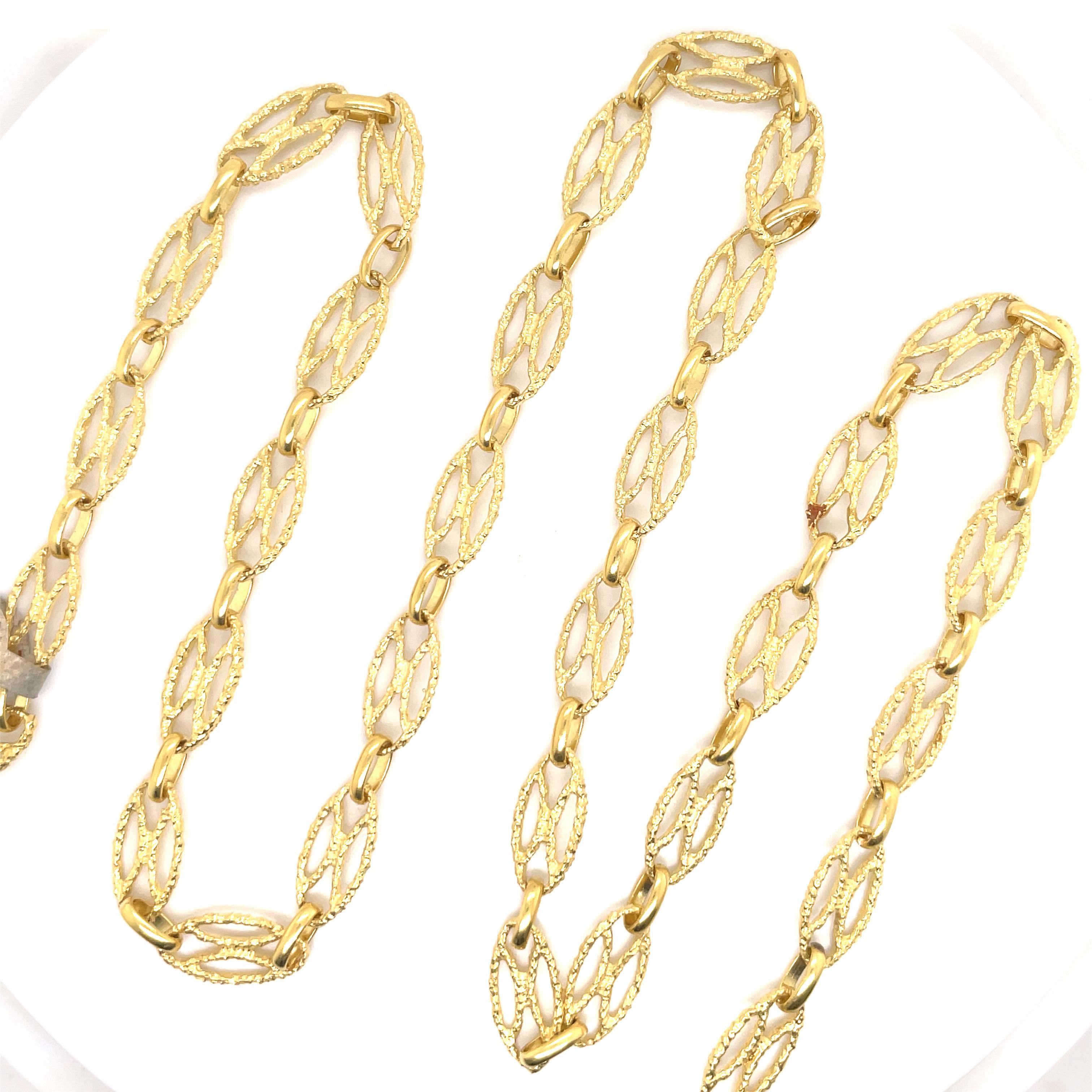 18 Karat Yellow Gold necklace featuring 33 oval openwork links measuring 27.4 inches, 42 grams.
Italian Hallmark. 
Great for layering!