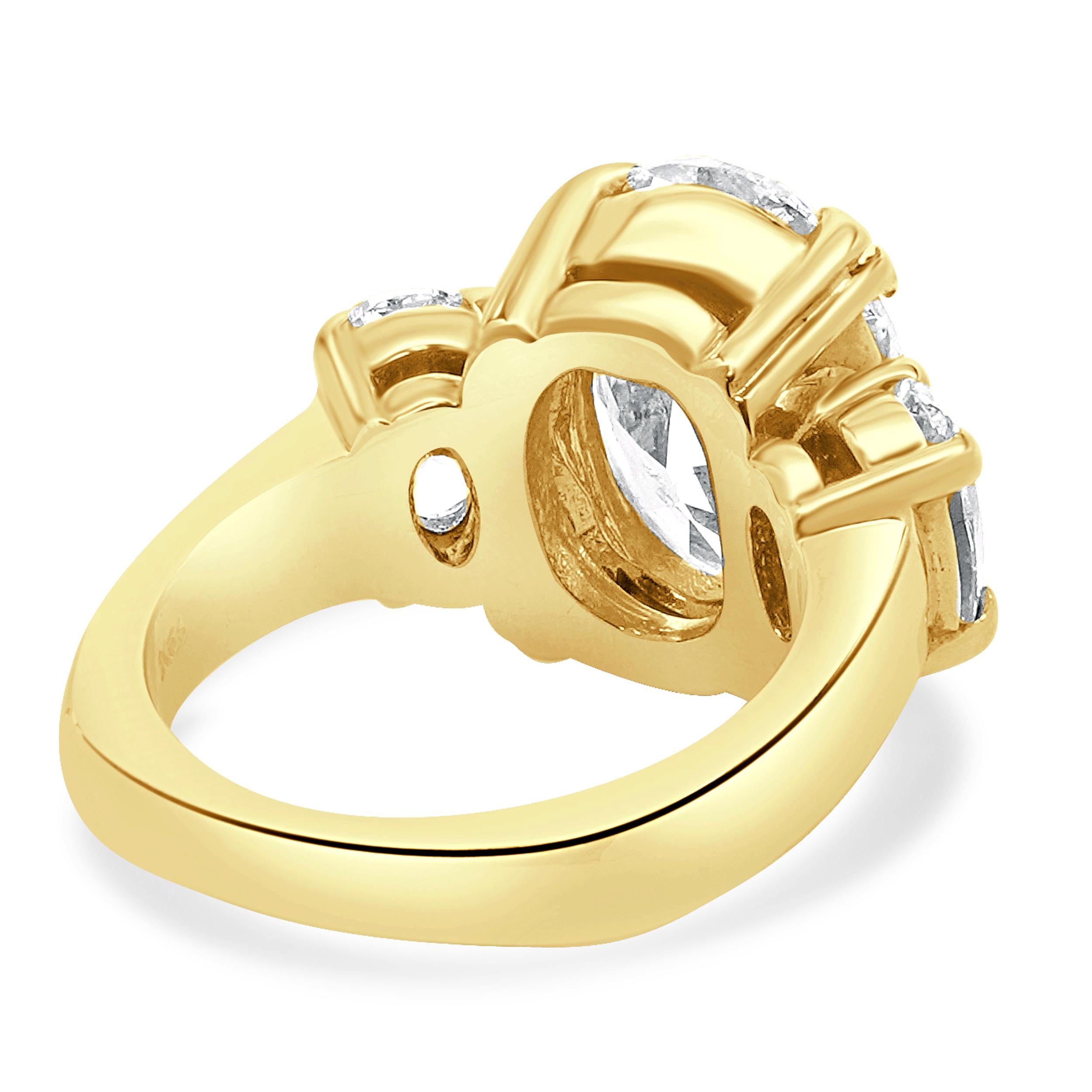 Oval Cut 18 Karat Yellow Gold Oval Three Diamond Engagement Ring For Sale