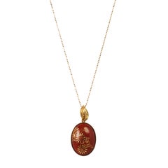 18 Karat Yellow Gold Oxblood Coral Chrysanthemum Engraved Oval Pendant Top