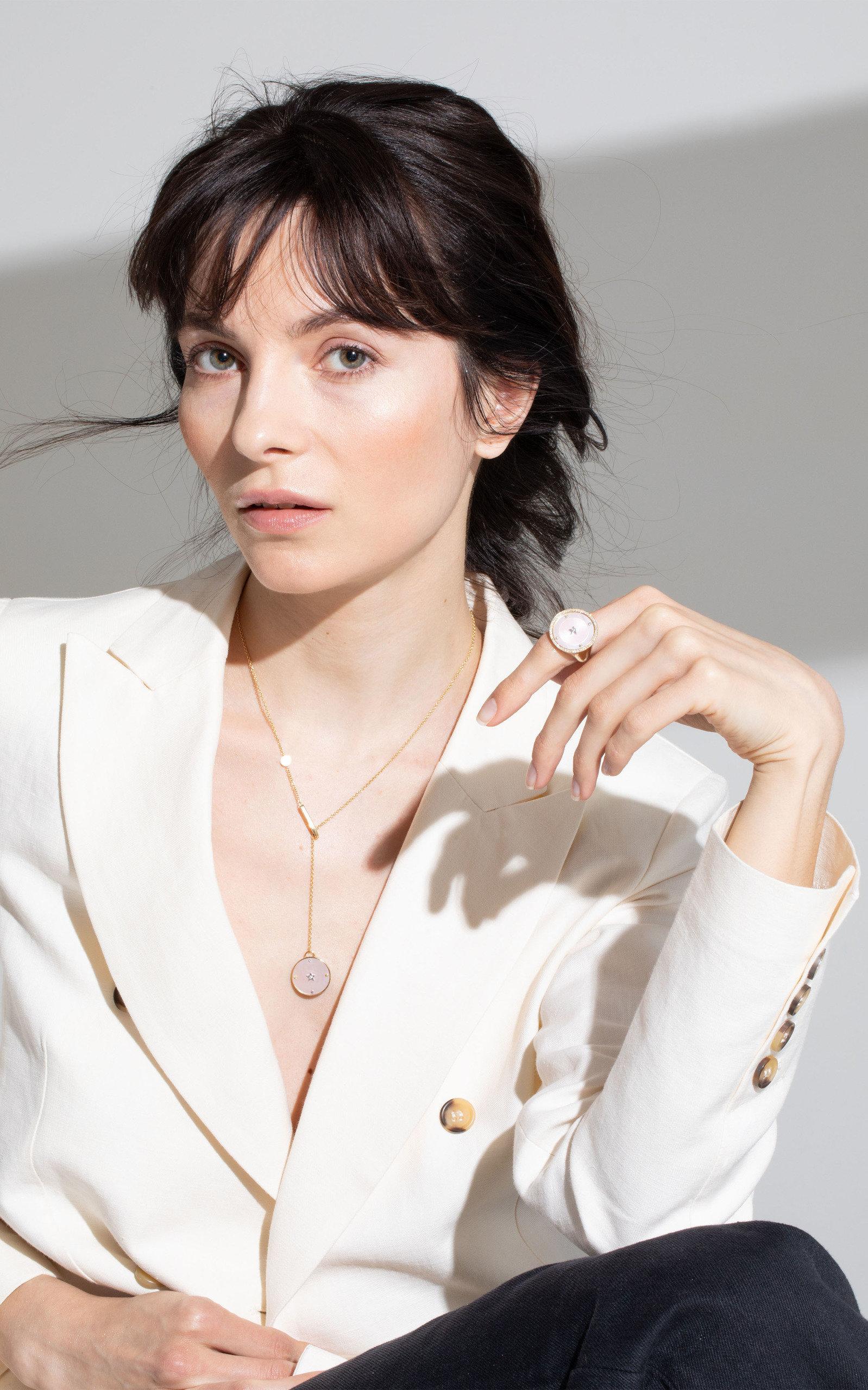 Inspired by the concept of time, Anna Maccieri Rossi's 'ORA Pendant' features a pink mother of pearl dial where the hours of the day are marked by multicolored sapphires with diamond star at center.
PRODUCT DETAILS
Clasp closure
Composition: 18K