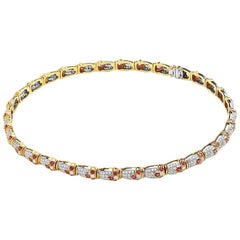 Collier ras du cou en or jaune 18 carats pavé de diamants et de rubis