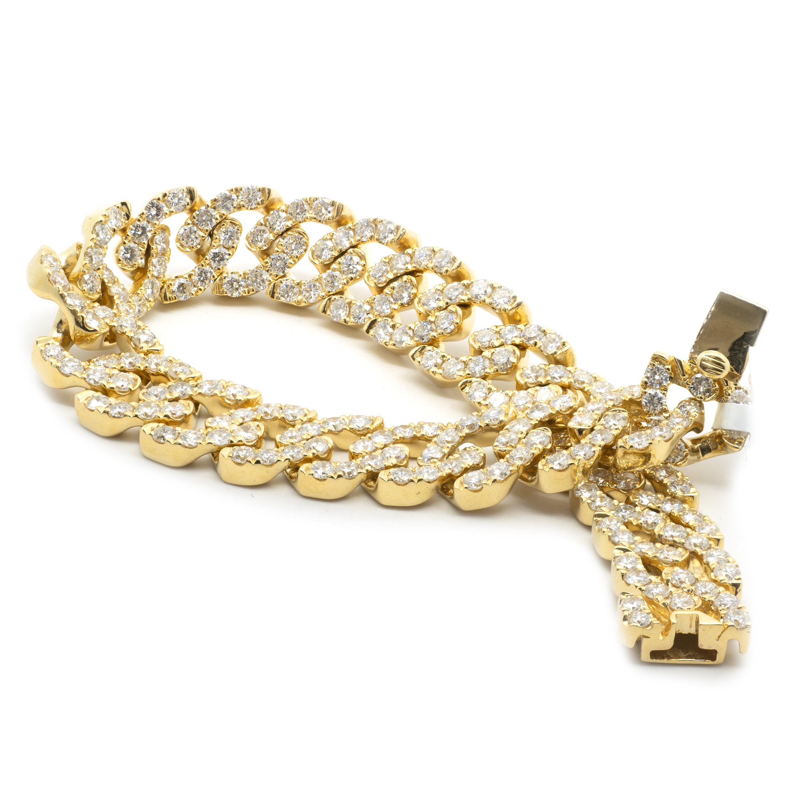 Designer: custom
Material: 18K yellow gold
Diamonds: 197 round brilliant cut = 10.92cttw
Color: G
Clarity: VS2
Dimensions: bracelet will fit up to a 7.5-inch wrist
Weight: 46.79 grams
