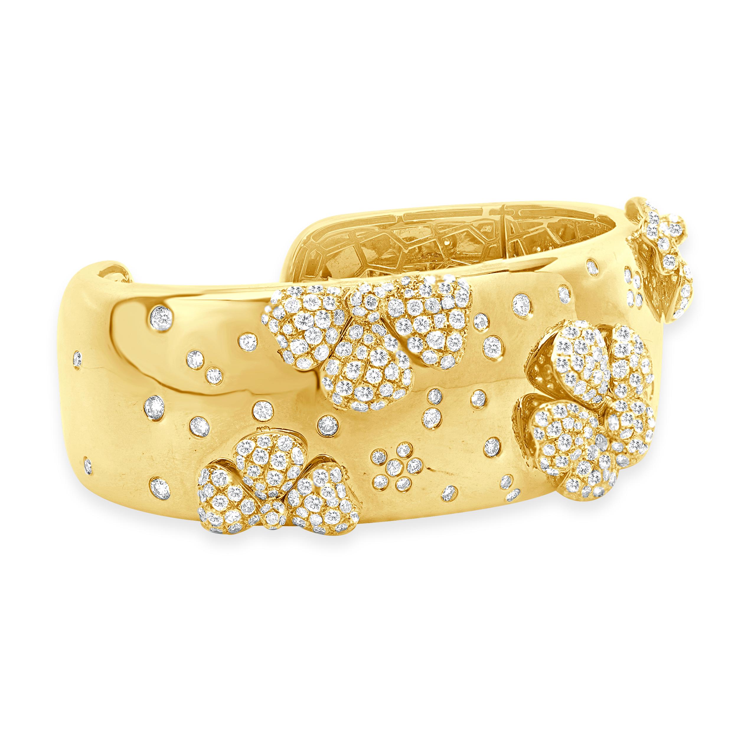 Designer: custom
Material: 18K yellow gold
Diamond: 316 round brilliant cut = 7.55cttw
Color: G
Clarity: SI1-2
Dimensions: bracelet will fit up to a 6.75-inch wrist
Weight: 66 grams

