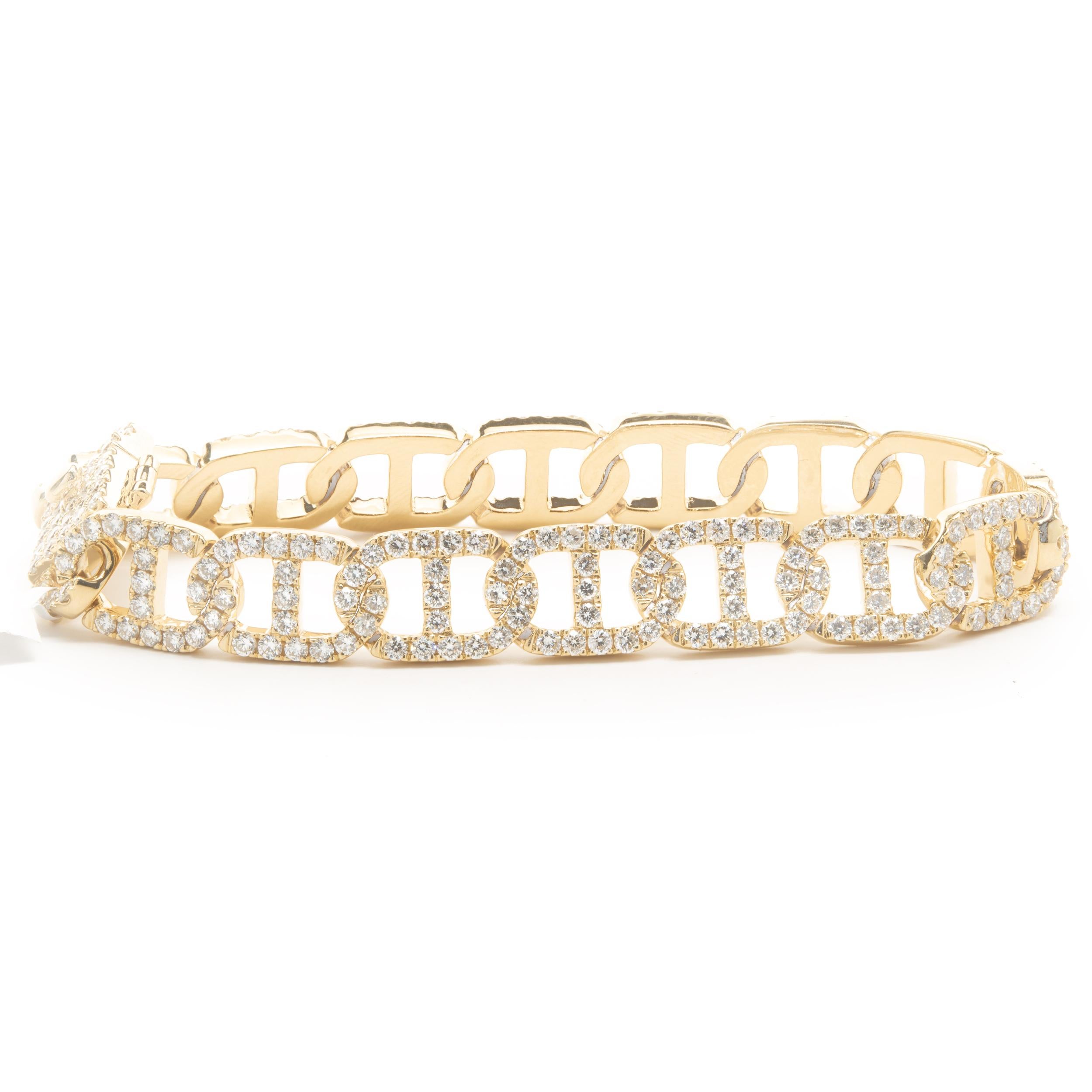 Designer: custom
Material: 18K yellow gold
Diamond: 289 round brilliant= 7.21cttw
Color: G 
Clarity: VS1
Dimensions: bracelet measures 7.25-inches in length
Weight: 36.49 grams