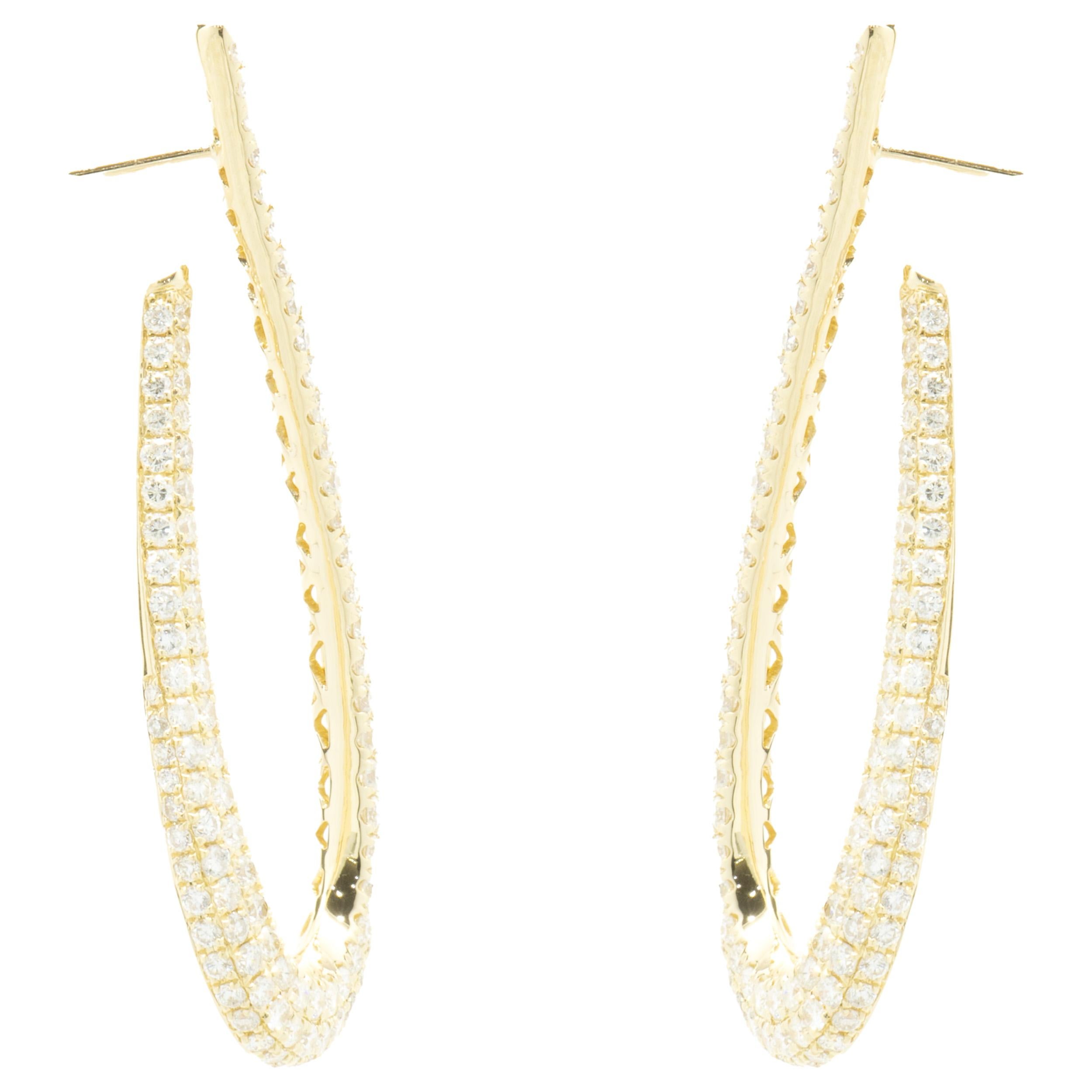 Designer: custom design
Material: 18K yellow gold
Diamonds: 234 round brilliant cut = 4.25cttw
Color: F
Clarity: VS2
Dimensions: earrings measure 60mm in length
Weight: 10.84 grams