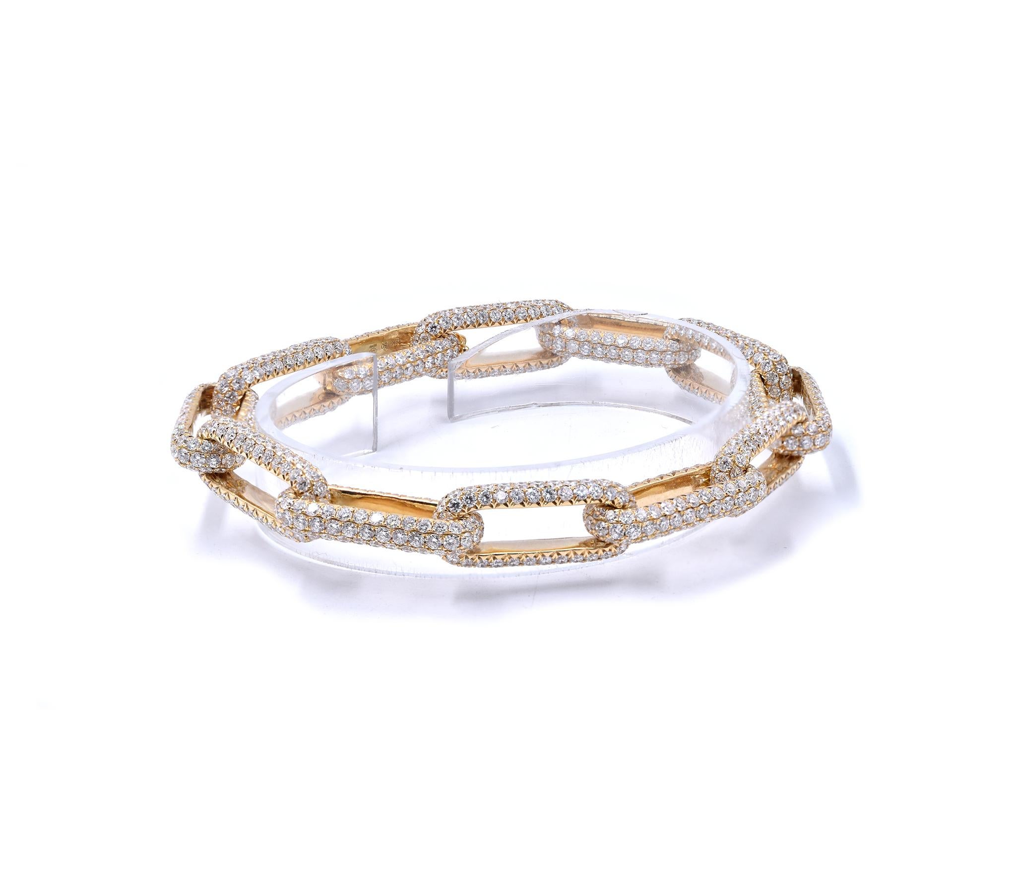 Designer: custom designed 
Material: 18K yellow gold
Diamonds: 1060 round cut = 20.54cttw
Color: G
Clarity: VS2
Dimensions: bracelet will fit a 8.25-inch wrist 
Weight:  35.67 grams
