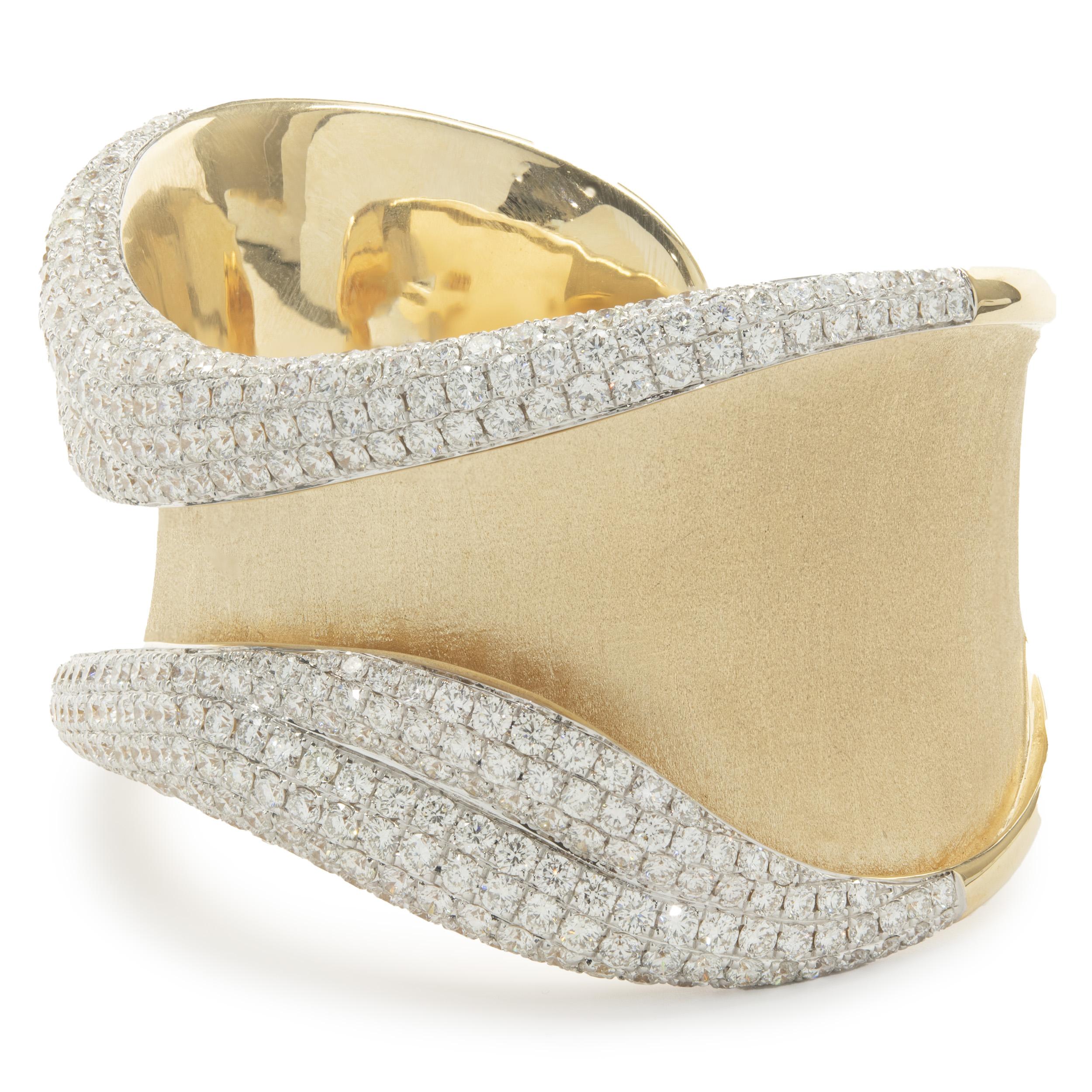 Designer: custom design
Material: 18K yellow gold
Diamonds: 422 round brilliant cut = 19.50cttw
Color: G
Clarity: VS1-2
Dimensions: bracelet will fit up to a 7-inch wrist
Weight: 109.64 grams
