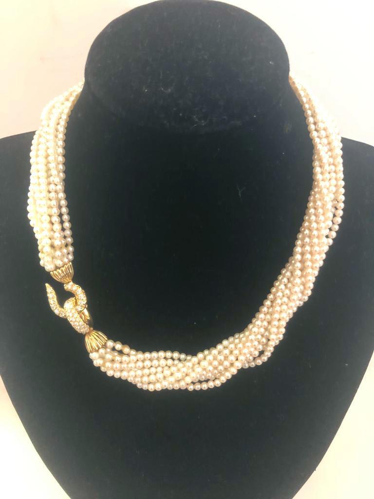 Vintage Italian necklace with 11 strands of cultured pearls in 18 karat yellow gold and diamonds for a total of 0.5 karats / Made in Italy 1970s