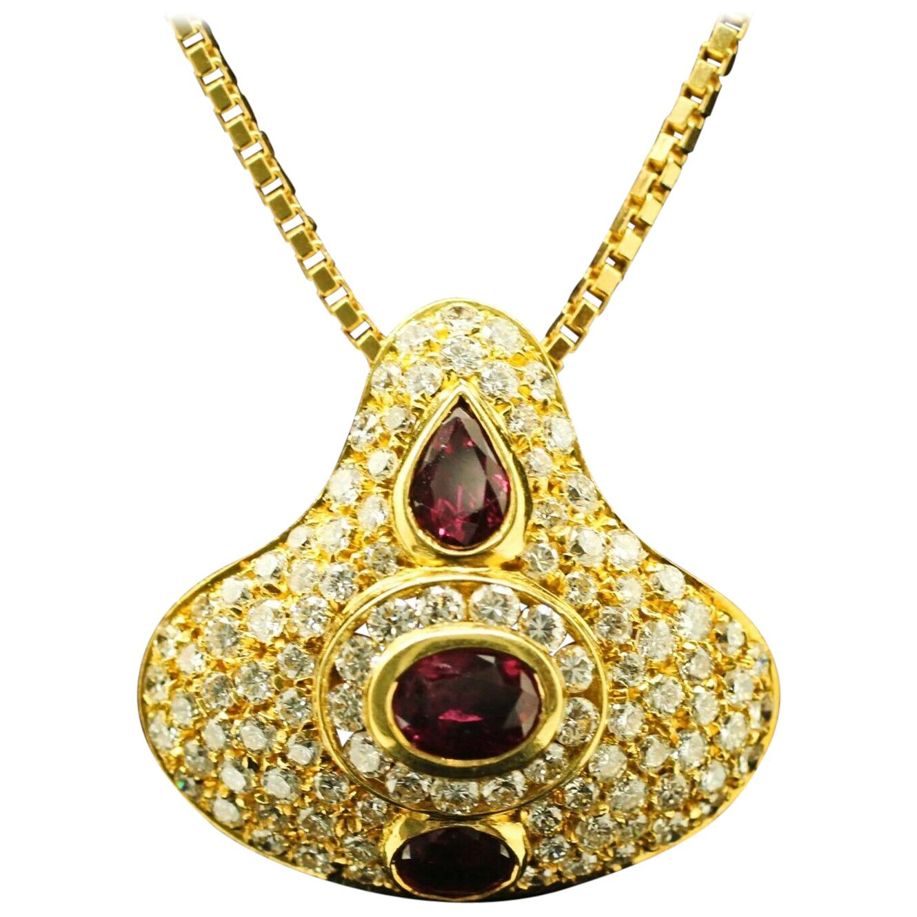 18 Karat Yellow Gold Pear-Shaped and Oval Ruby and Diamond Pendant