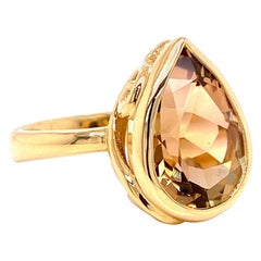 18 Karat Yellow Gold Pear Shaped Peach Tourmaline Ring