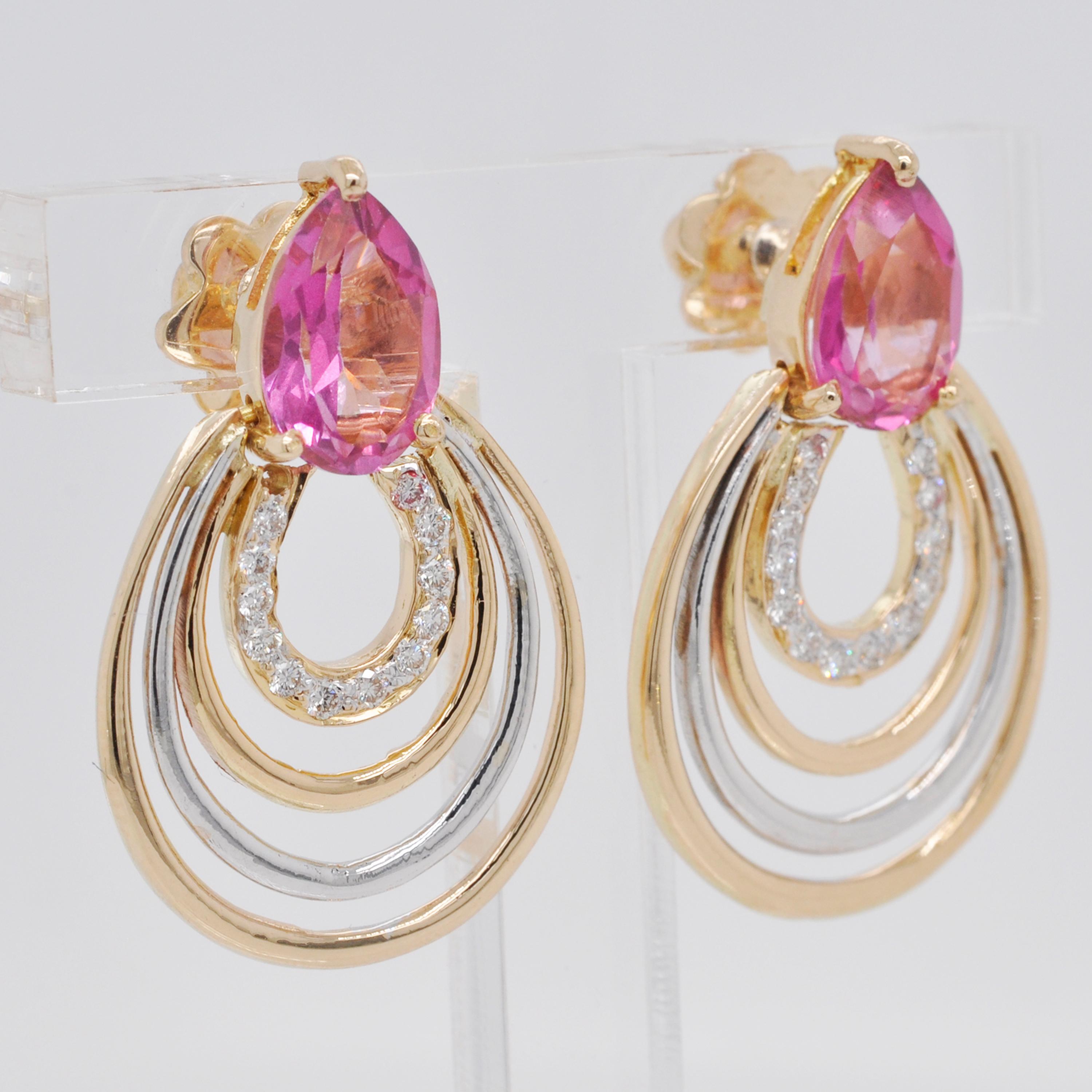 18 Karat Gelbgold birnenförmige rosa Turmalin-Diamant-Tropfenohrringe

Dieses Paar Ohrringe aus 18 Karat Gold ist äußerst elegant und stilvoll. Ein glänzender birnenförmiger rosafarbener Turmalin an der Oberseite und eine birnenförmige