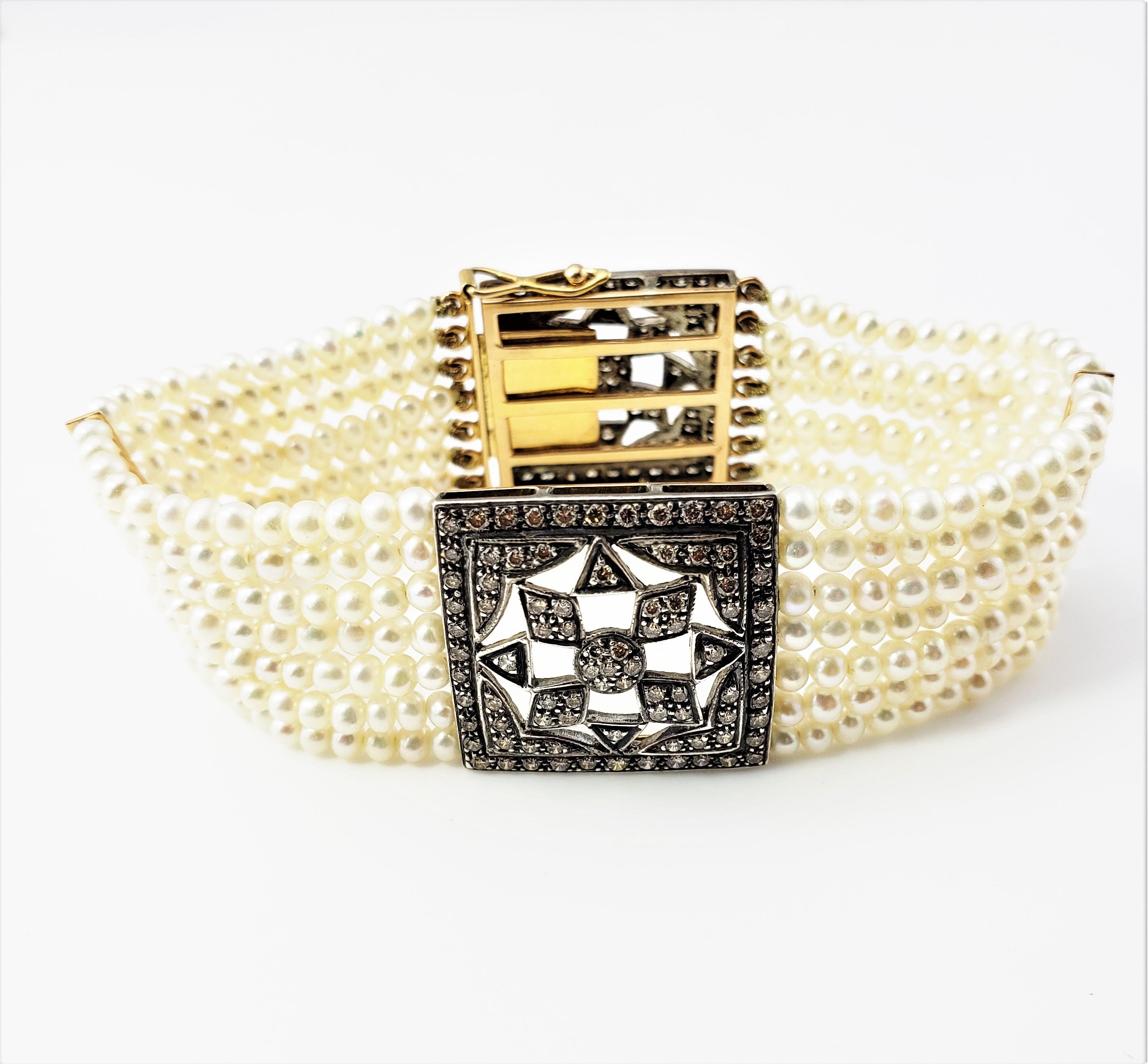 Armband aus 18 Karat Gelbgold mit Perlen und Diamanten (Brillantschliff)