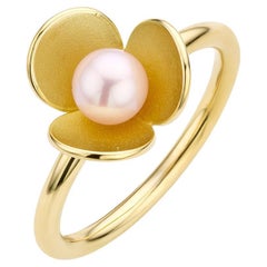 Bague fleur en or jaune 18 carats