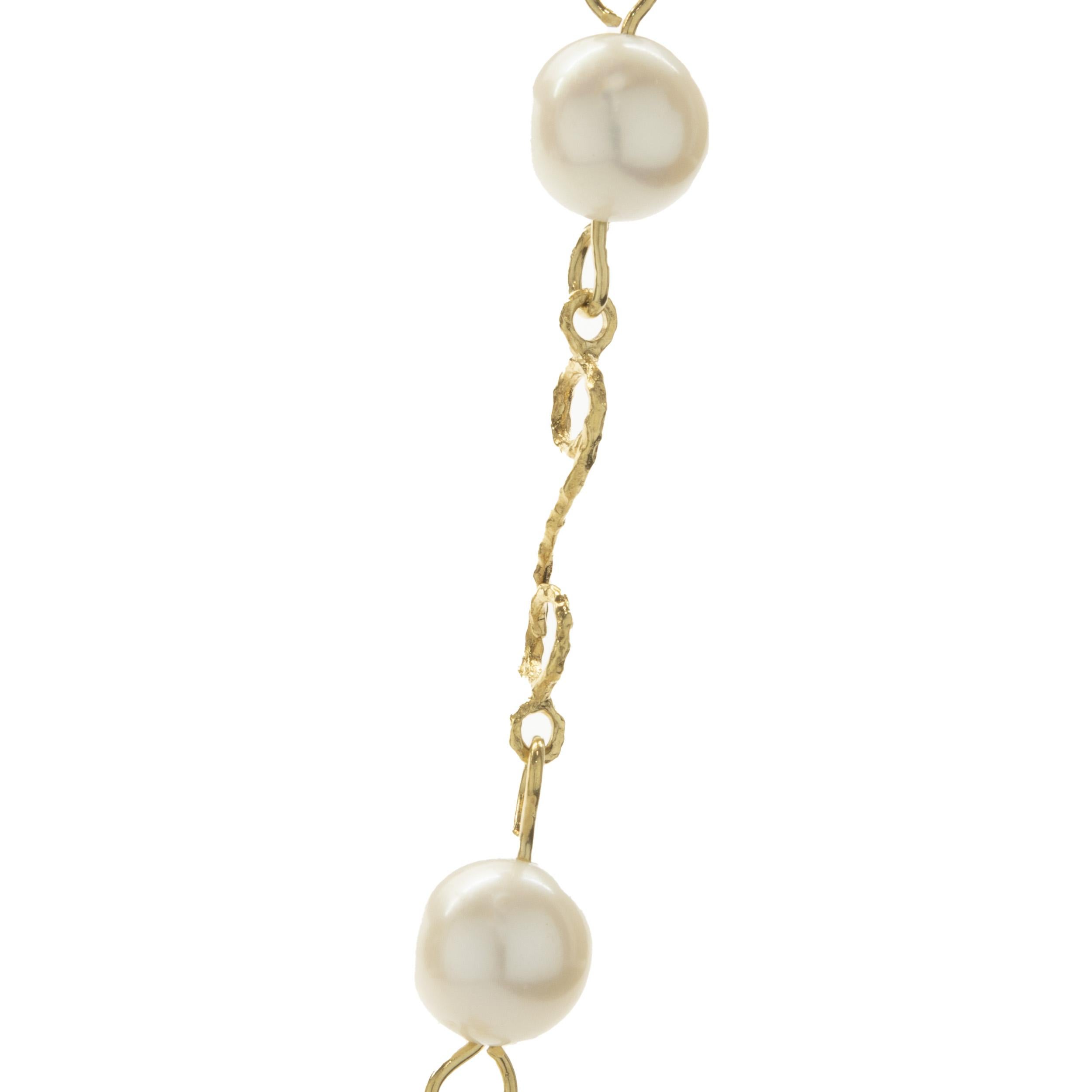 Designer: custom
Material: 9mm pearl / 18K yellow gold
Weight: 43.65 grams
Dimensions: necklace measures 32-inches