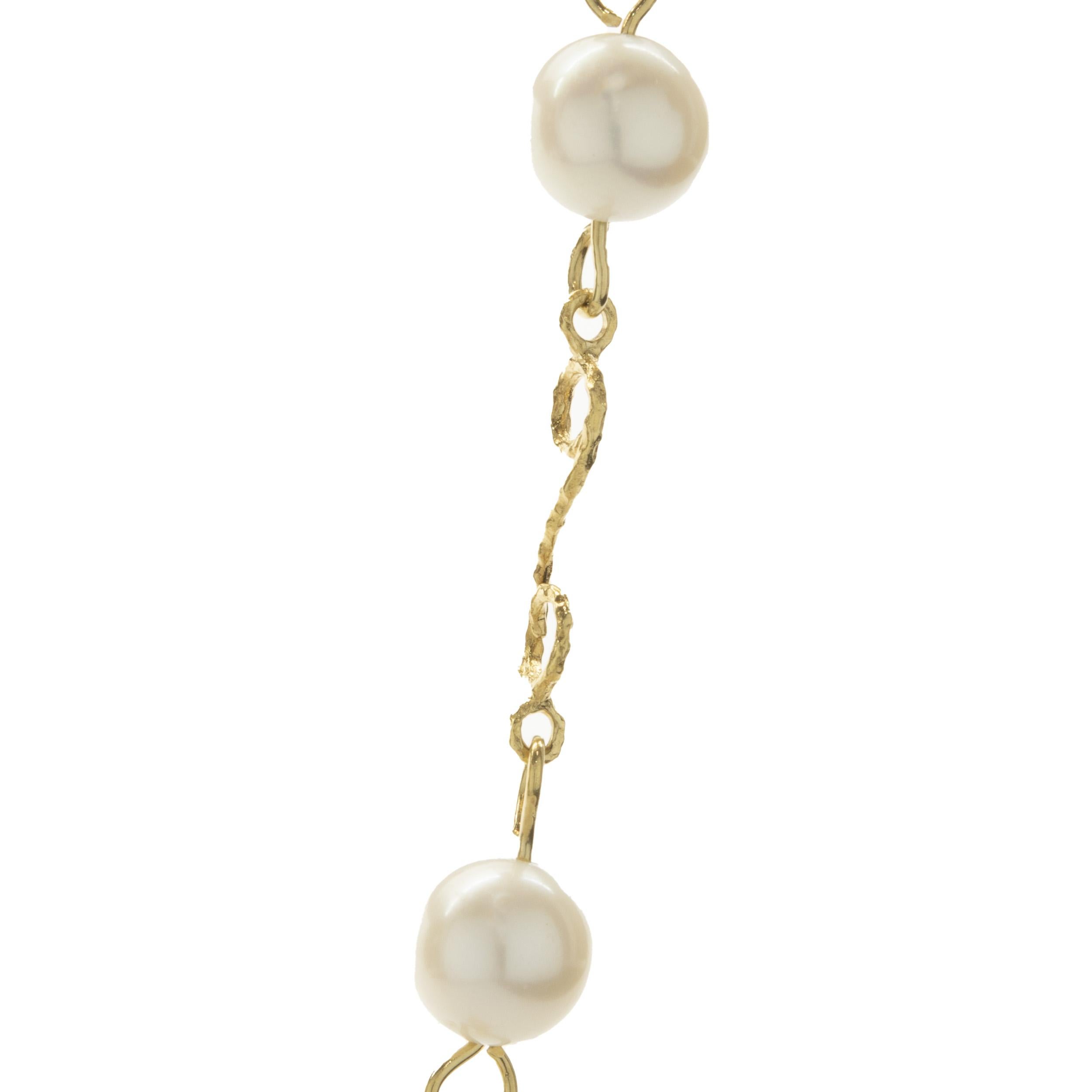 Designer: personalizzato
Materiale: Perla da 9 mm / oro giallo 18 carati
Peso: 43,65 grammi
Dimensioni: la collana misura 32 pollici