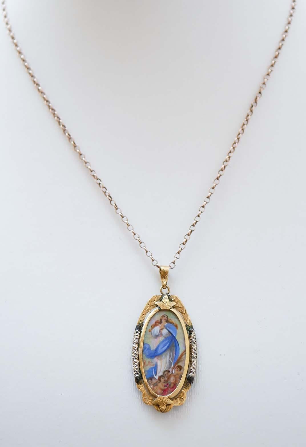 Retrò pendant in 18 kt yellow gold representing a lady motif with little angels.
The pendant will come with a rubber chain with steel closure.
Total Weight 3.80 gr
RF  +GEUH

For any information, feel free to contact the seller through the message