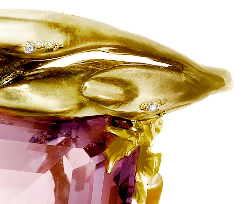 This Fairy Tale cocktail ring features a huge pink kunzite and is made of 18 karat yellow gold with diamonds. It was featured in Vogue UA and is a piece of jewelry designed by artist and oil painter Polya Medvedeva. Over the last 13 years, her