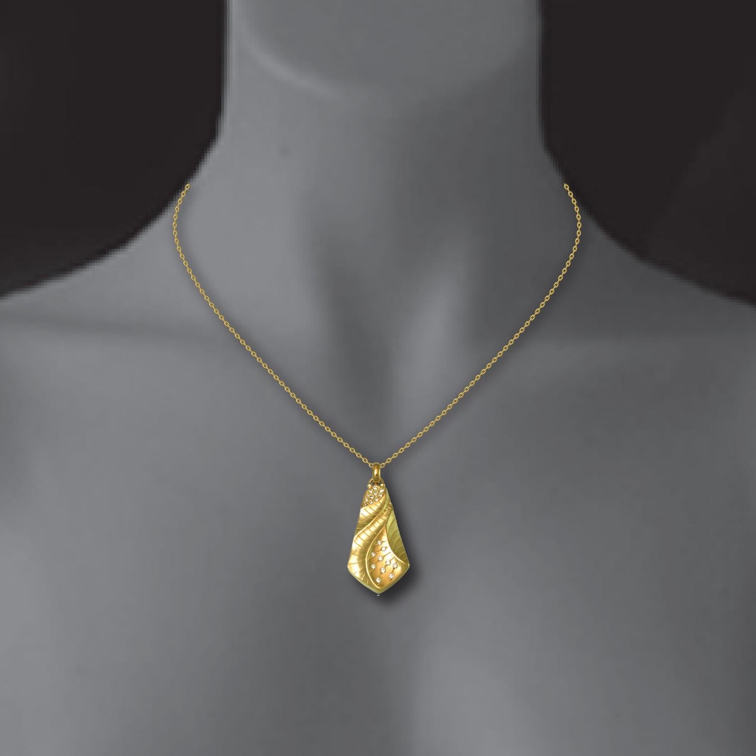 The amazing Kite Pendant is a wonderful display of Keiko Mita’s sweeping landscapes and Sand Dune texture. Made from 18k Yellow Gold and a delicate balance of 0.25ct Diamonds, the pendant is 40 x 17mm and comes with an 18k Yellow Gold single strand