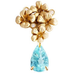 Collana con ciondolo in oro giallo a diciotto carati, diamanti e tormalina Paraiba